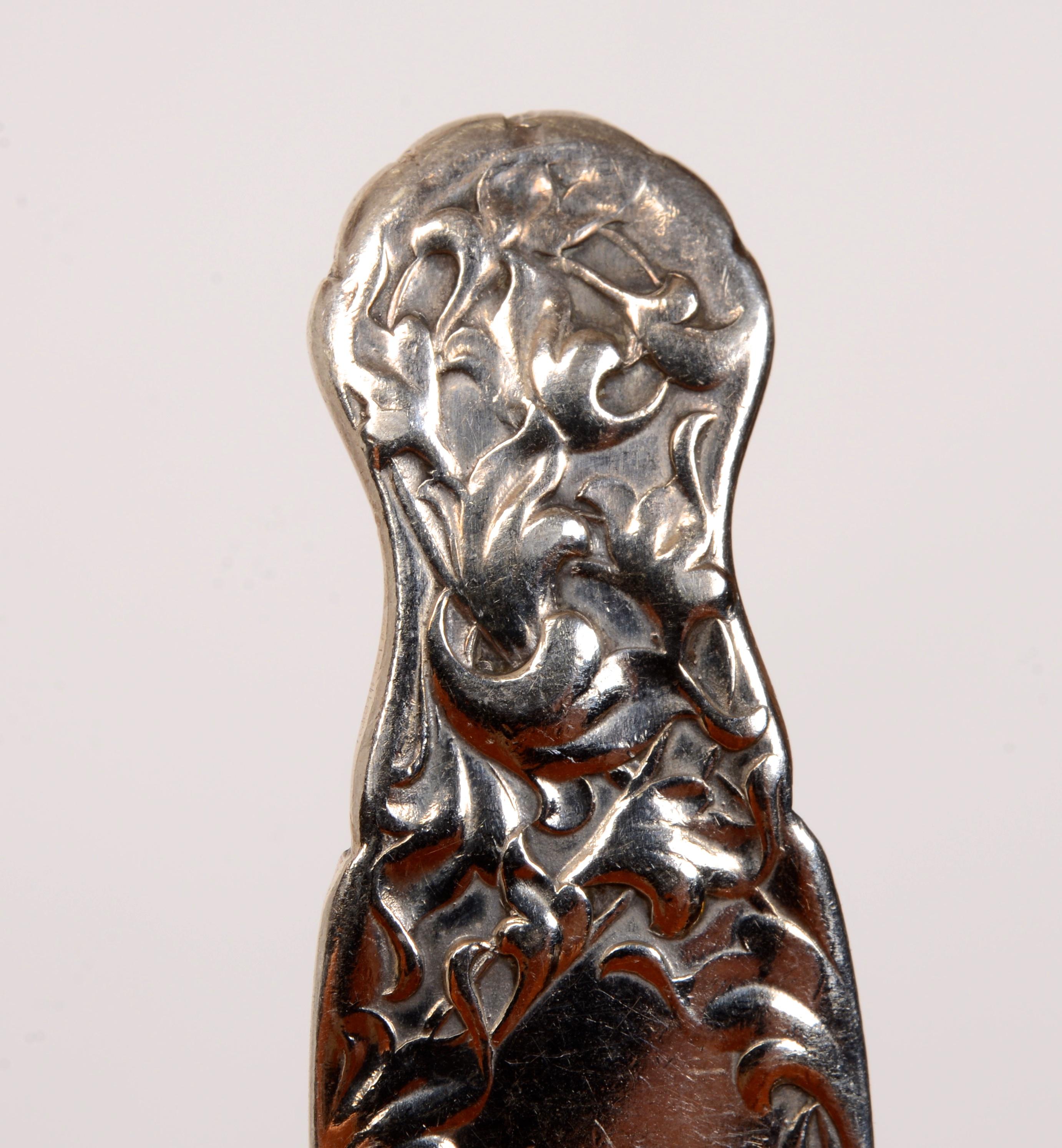 Set of 8 Sterling Silver Teaspoons in the Heraldic Pattern by Meriden/International Silver Company, c1880.