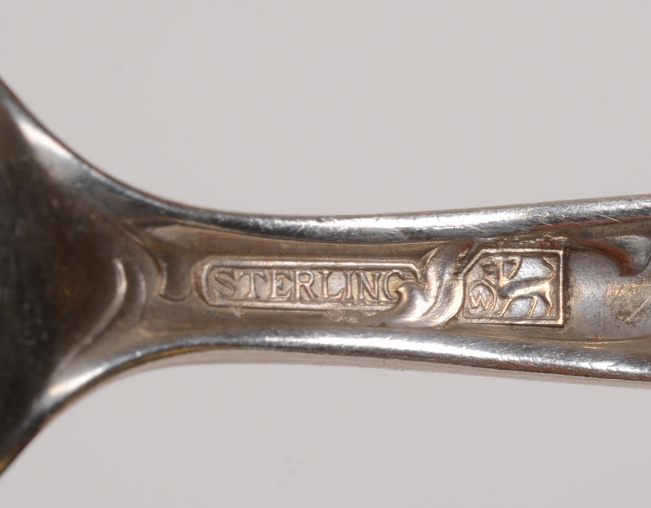Late 19th Century Set of 8 Sterling Silver Teaspoons Heraldic Pattern by Meriden/International Co. For Sale