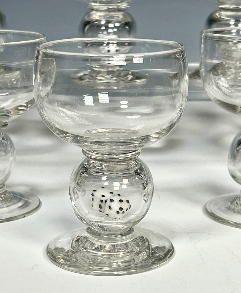 These super rare and fun cocktail glasses will be the topic of conversation at any gathering. Each hand blown crystal goblet features a large circular connector with 2 dice ready for the next bet. They are not affixed so they move about when shaken(