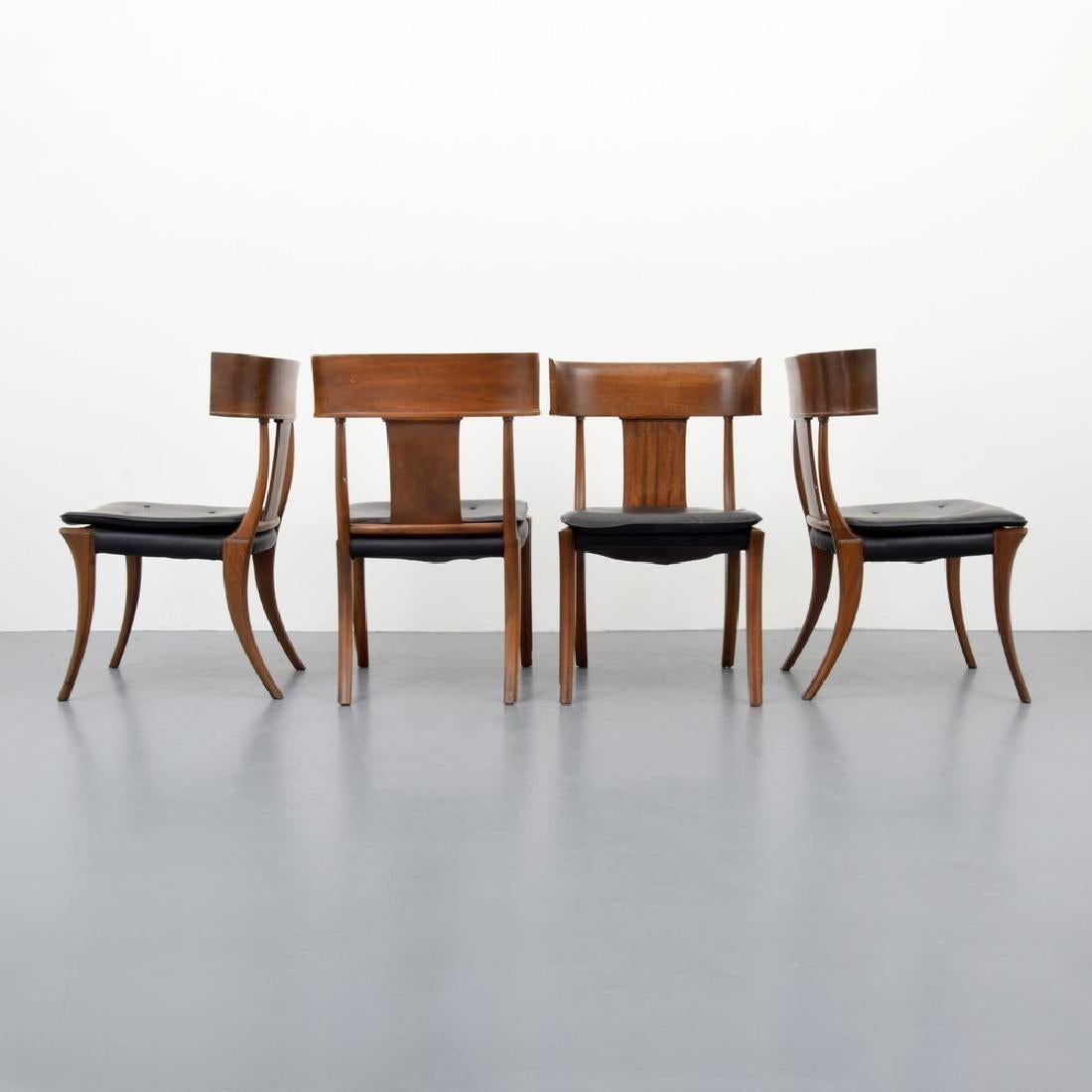A set of eight Stewart & MacDougall klismos dining chairs created by Kipp Stewart and Stewart MacDougall. The concave crest rail, center splat, and side rails taper into splayed legs typical of the klismos design, and all are made from walnut. The