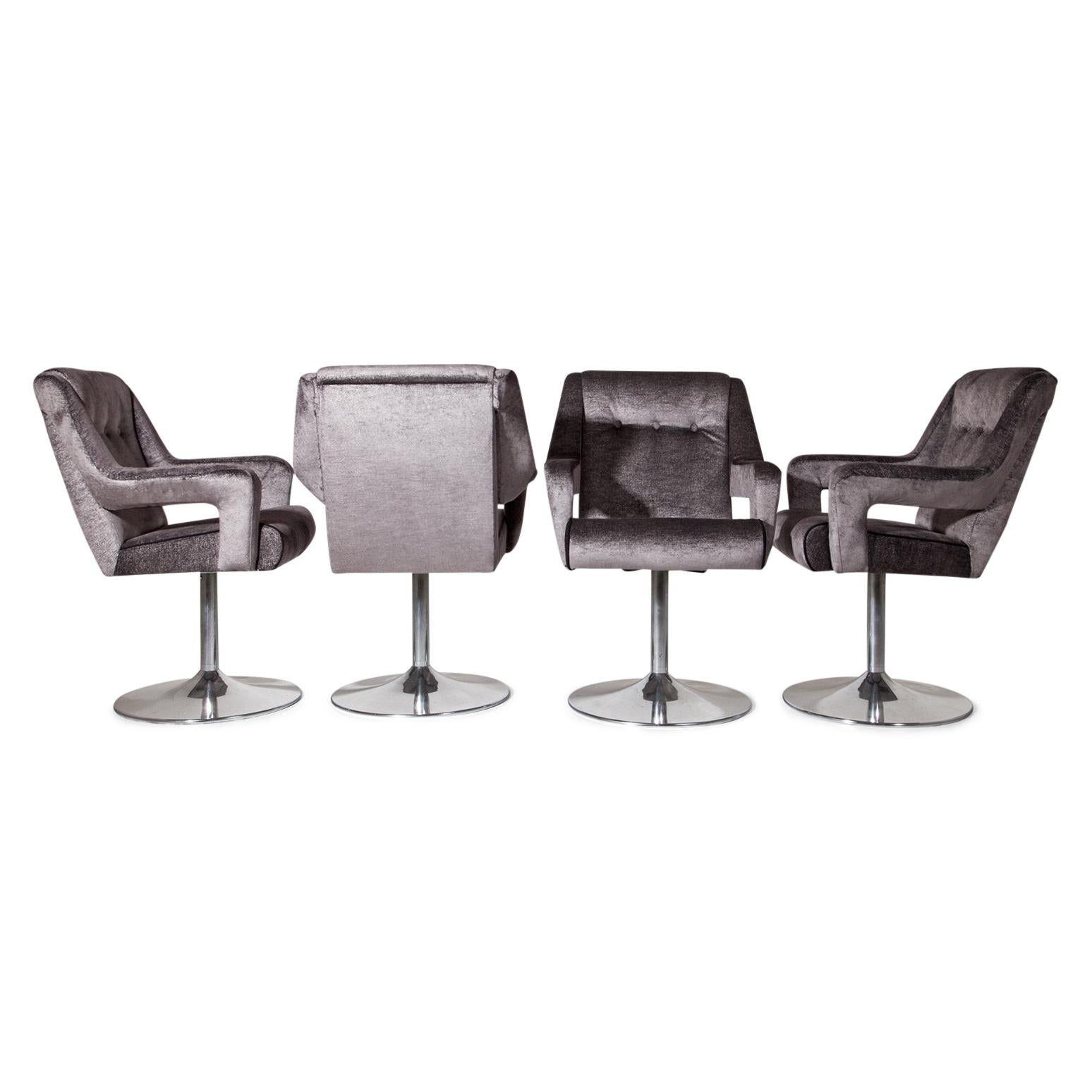 Set of six swivel chairs on round chromed legs and upholstered seats with armrests. The chairs were reupholstered with a high quality fabric in grey with silver-colored threads.
