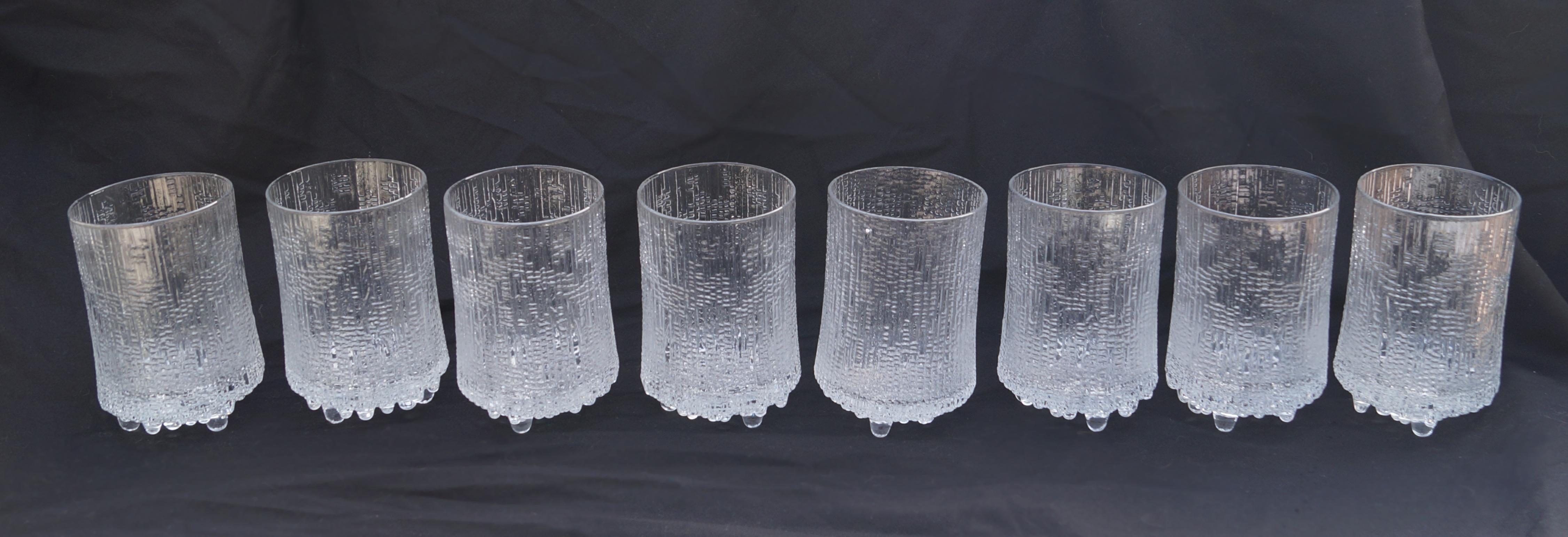 Set of 8 Vintage Mid-Century Modern Tapio Wirkkala Ultima Thule Glass Glasses . They have a  3 foot / footed bottom. The top lip is approx 3 1/8