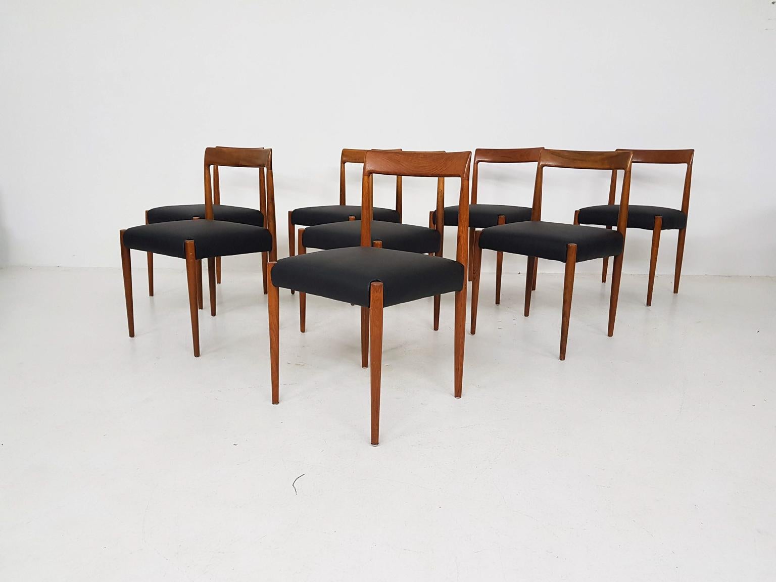 Teak dining chairs with all new black real leather upholstery, new springs and new filling.

Lubke was a German midcentury Furniture producer. Heavily influenced by Danish designer like Niels Otto Moller, Henry W. Klein, Kai Kristiansen and Finn