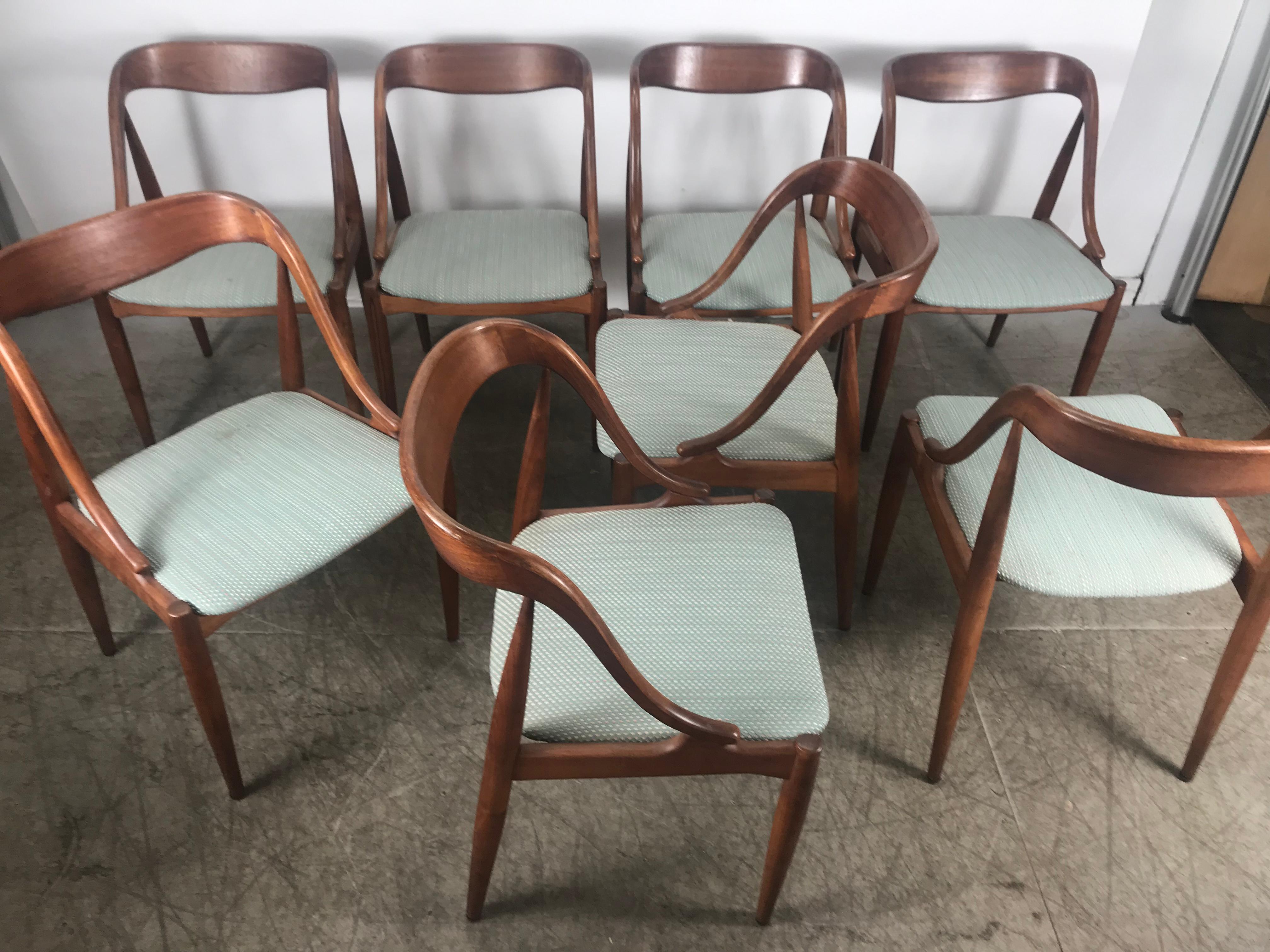 Set of 8 teak dining chairs by Johannes Andersen for Moreddi, Denmark, worldwide known and appreciated furniture designer Johannes Andersen. His designs are considered high end Danish modern design. The chairs feature Andersen’s characteristic