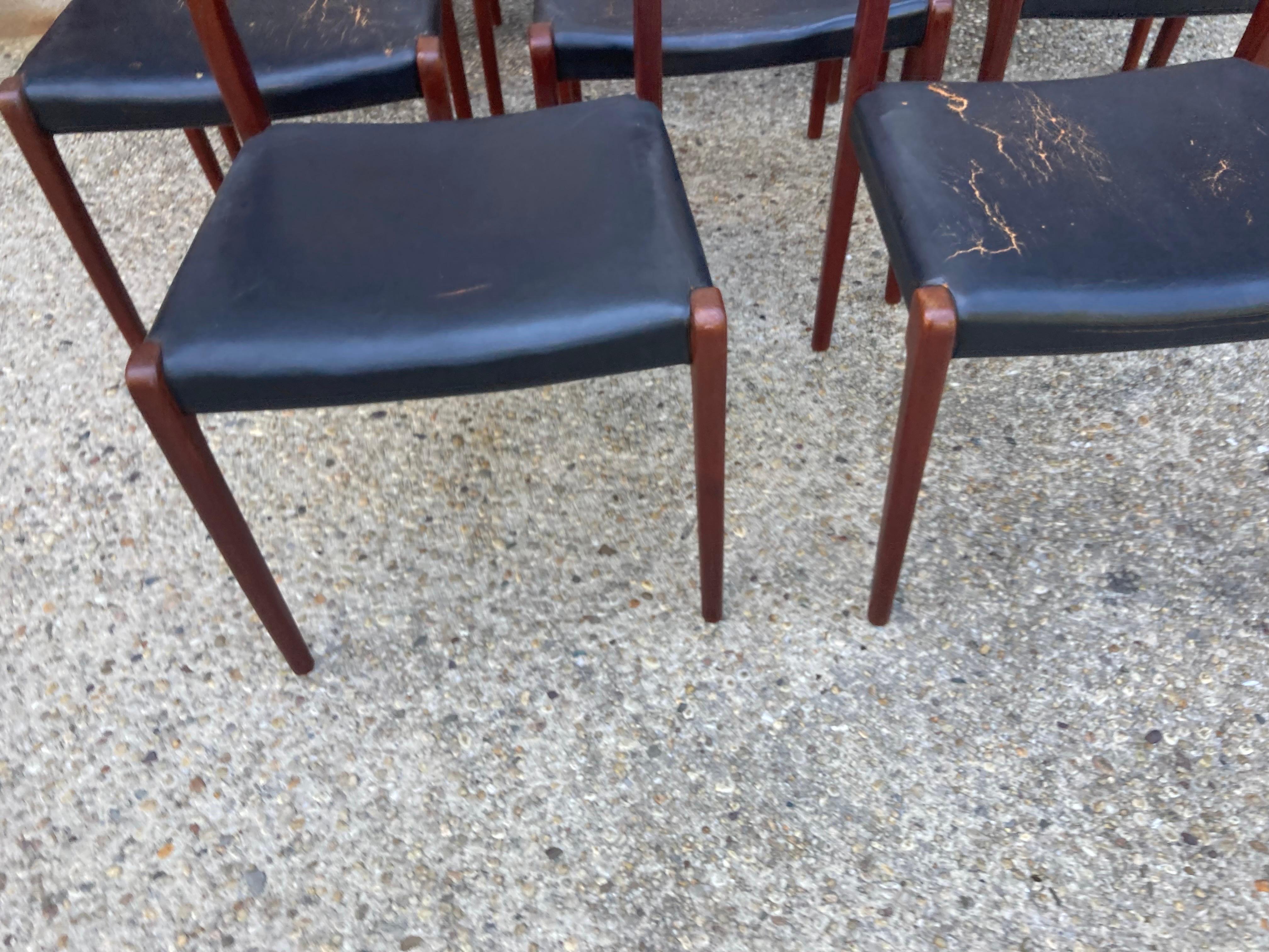 A great set of 8 teak Niels Moller no.71 dining chairs in very good condition but leather seats would need replacement with your own fabric/material.
