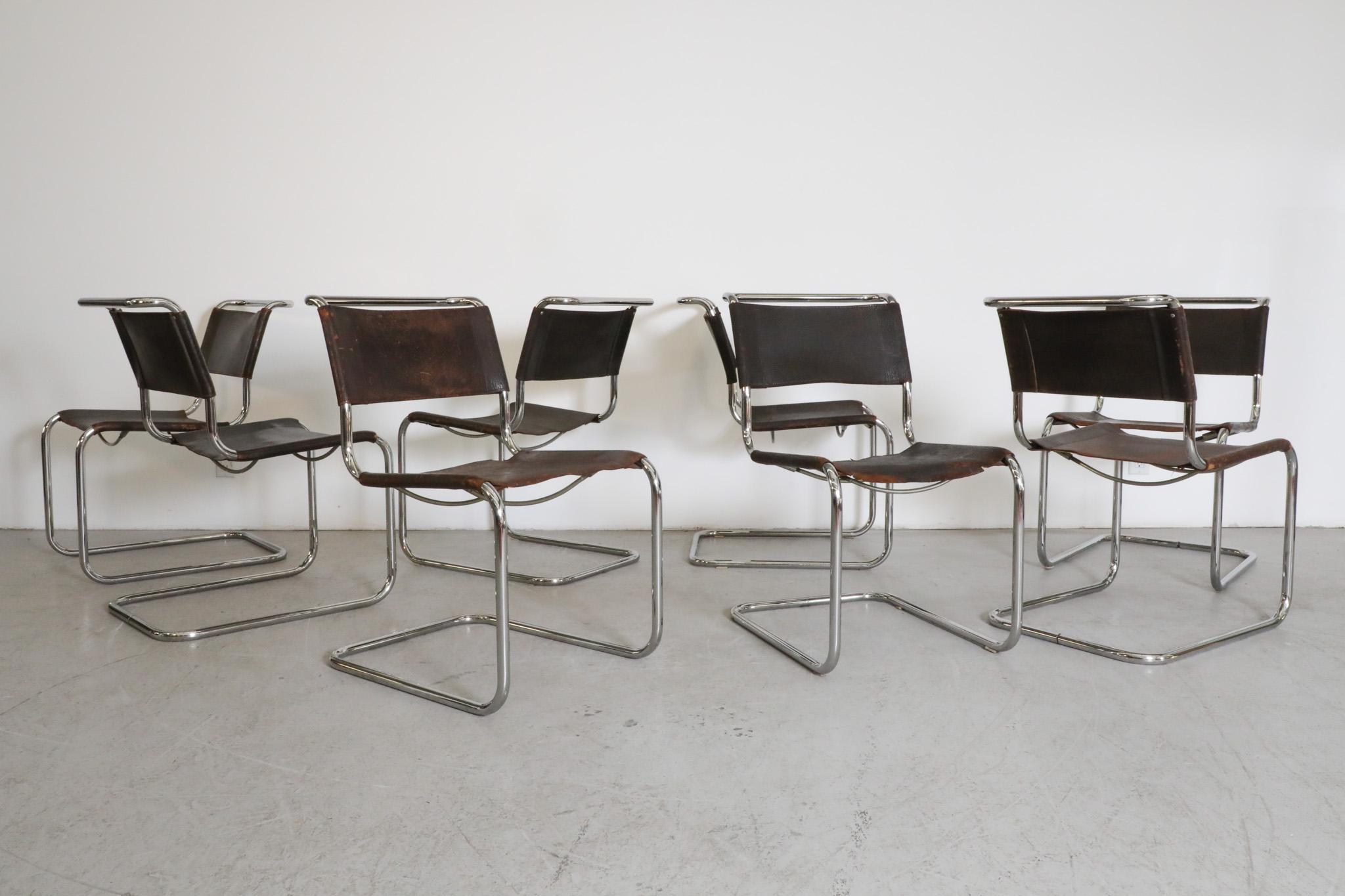 Set of 8 Mid-Century leather and chrome 'S33' dining chairs by Matt Stam for Thonet, 1970's. Original sling leather seats and backrests on tubular bent chrome frames. Classic styling with timeless design precisely executed to make a comfortable and