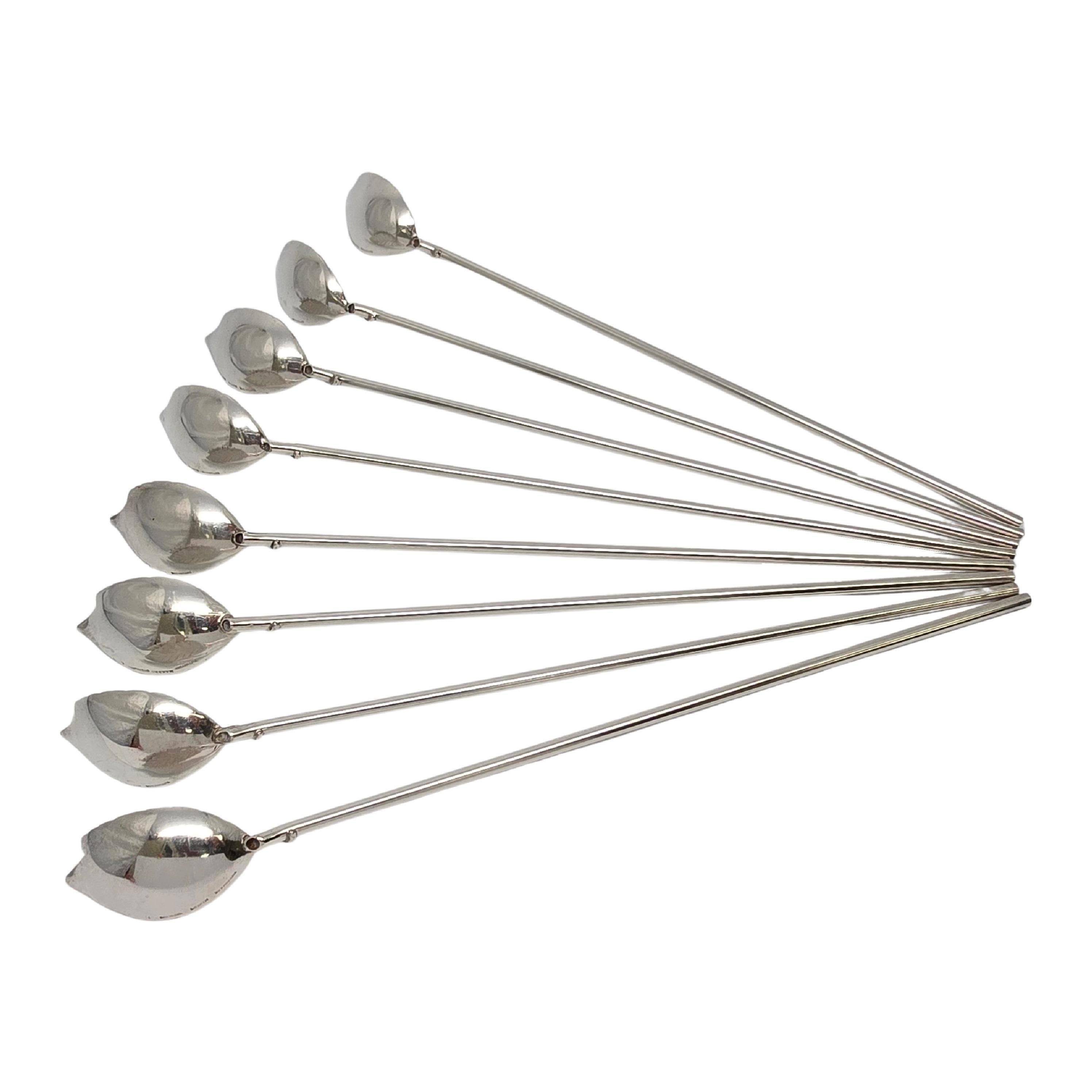 Set of 8 sterling silver iced tea or mint julep straw spoons by Tiffany & Co.

No monogram

Vintage set of spoons with leaf design bowls. The long handle is hollow and can be used as a straw. Hallmarks date these spoons to manufacture under the