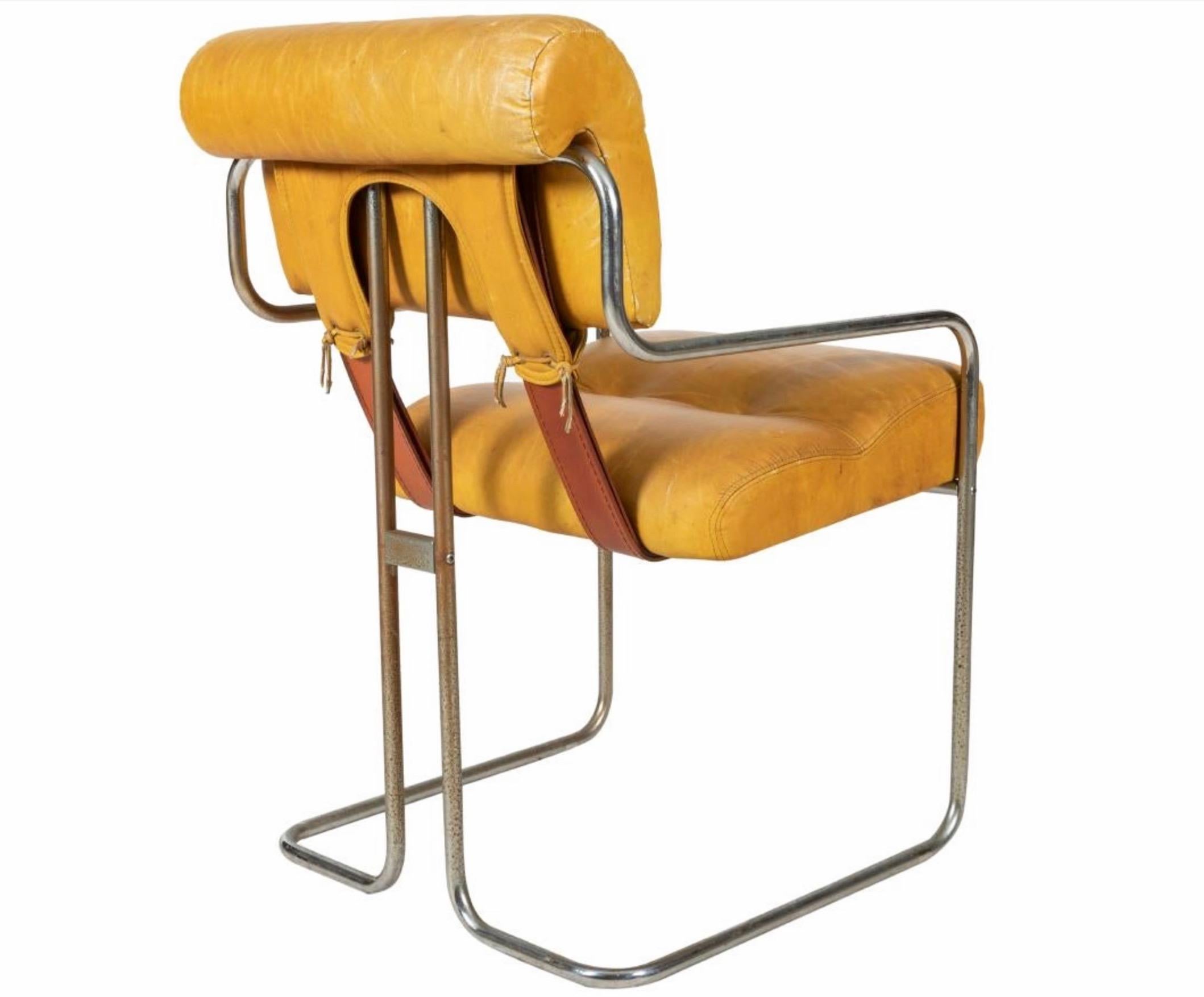 Classic leather chair by Guido Faleschini for Pace. Chrome chair with camel color leather. Great color and patina. Wear to chairs in varying degrees and worn condition. Priced as a set of 8. 