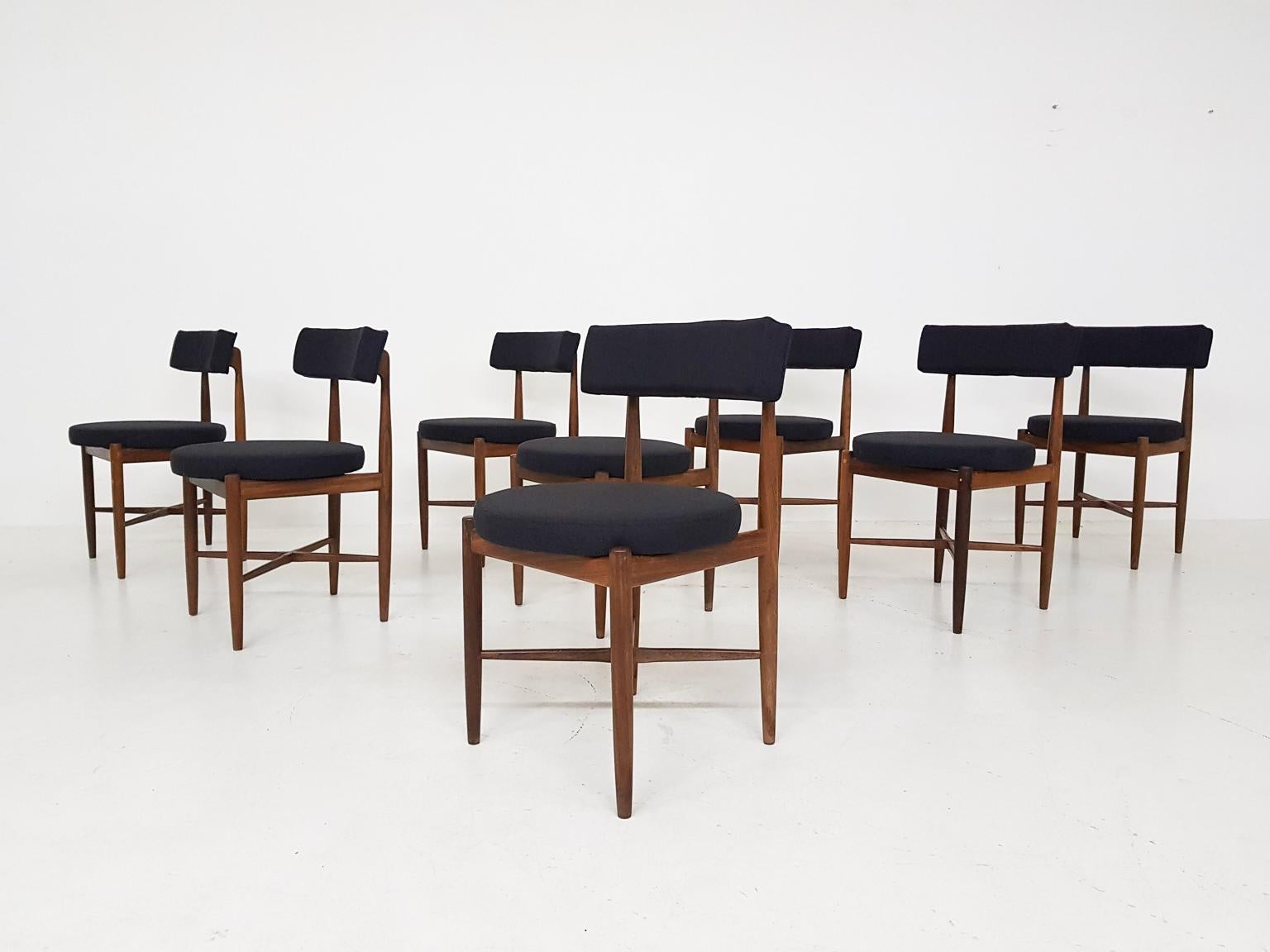 Set of eight teak dining chairs by Victor Wilkins for G-Plan, England, 1960s. The chairs have a new black upholstery.

This dining chair is designed by the British designer Victor Wilkins. The dining chair is highly influenced by the Danish