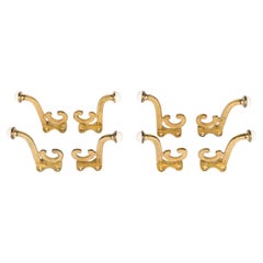 Set of 8 Victorian gilt brass hooks with white porcelain finials.