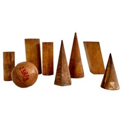 Set of 8 vintage antique wooden geometric shapes. Eastern Europe, c.1930-40