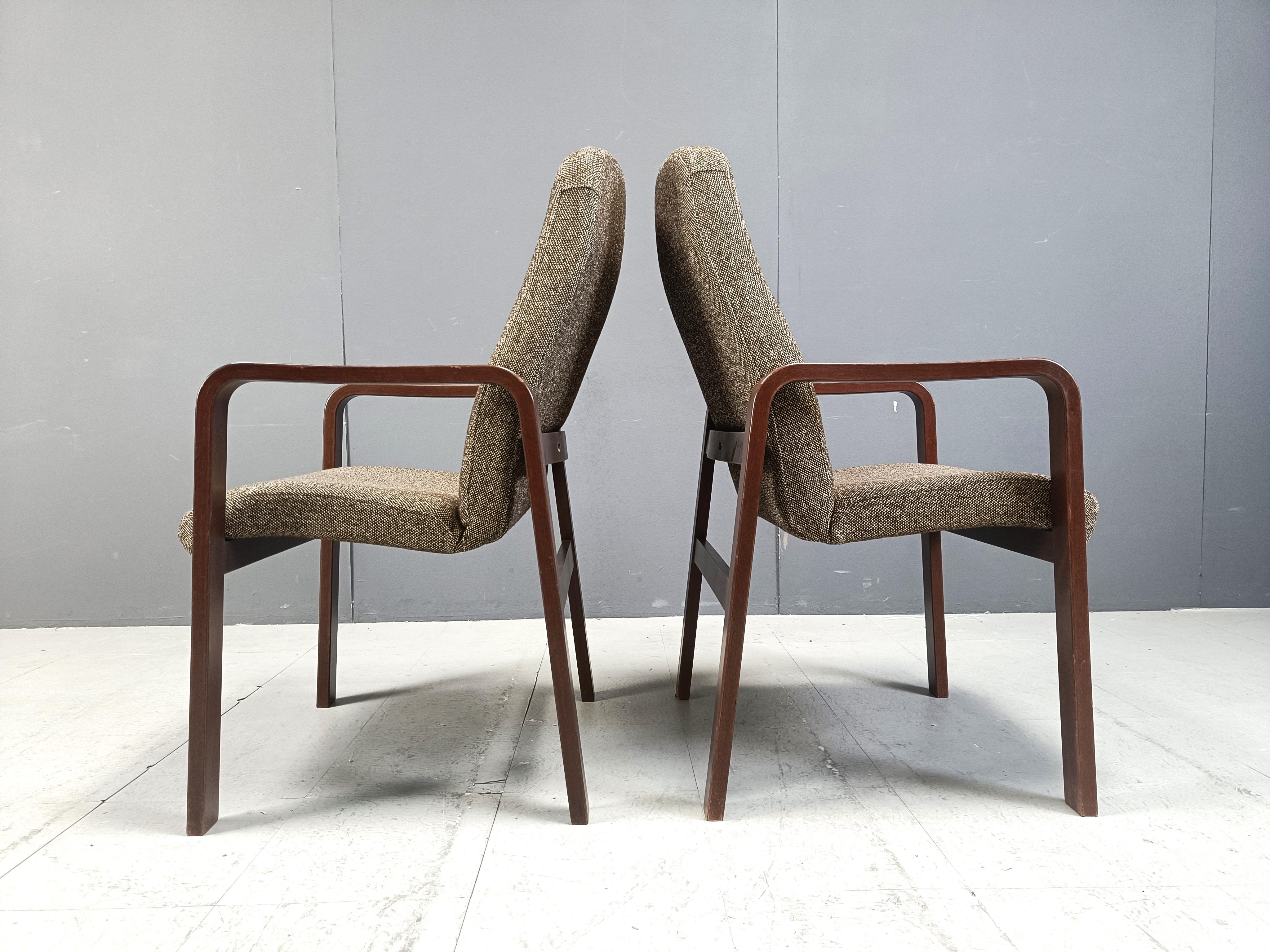 Vintage bent plywood armchairs with thick grey fabric cushions by AZ Zeitler, made in Germany.

Very comfy chairs with a timeless design.

Set of 8 

Dated 02/1993 

Dimensions:
Height: 96cm
Width x depth: 62cm
Seat height: 49cm

Ref.: 411521

*All
