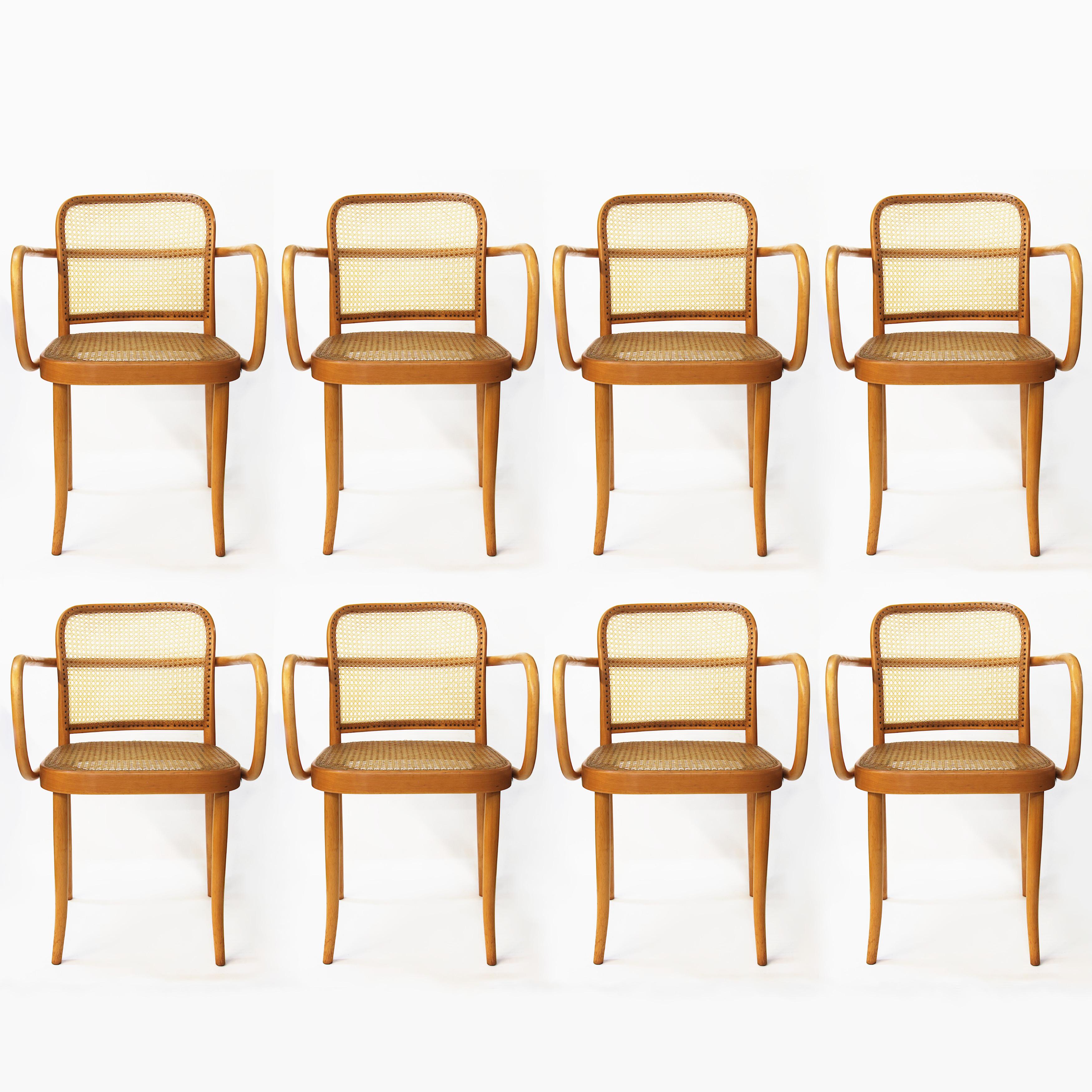 Wonderful set of eight dining chairs designed by Josef Frank and Josef Hoffmann for Stendig. Chairs feature swooping, bentwood birch frames, handwoven cane seats/backs, and that iconic Bauhaus, 