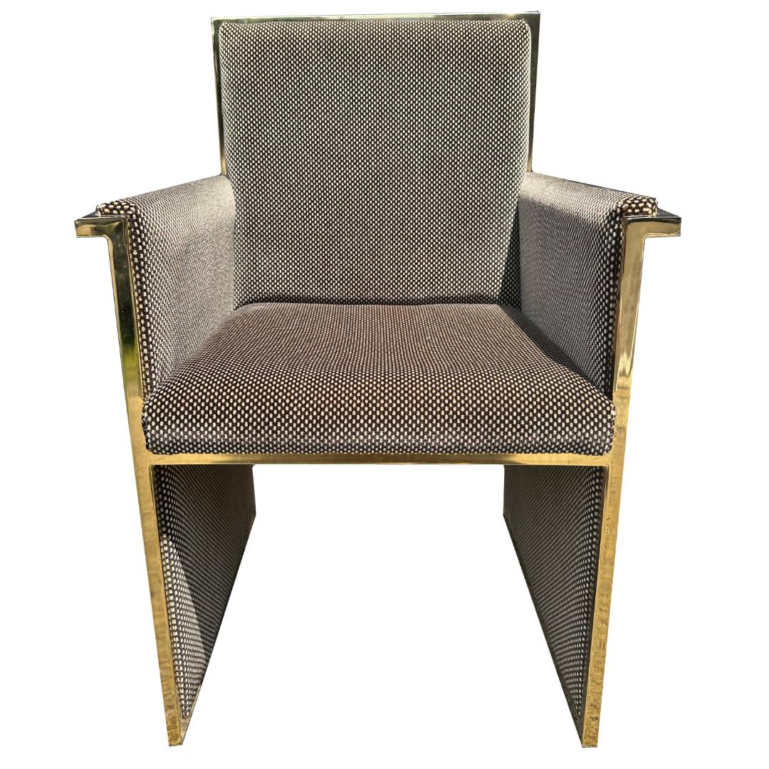 Set of 8 1970s dining arm chairs with brass frames and mohair upholstery manufactures in the style of Milo Baughman. The sexy material combination brings a Tom Ford-esque vibe to the modern silhouette. Brass and mohair are in good condition with