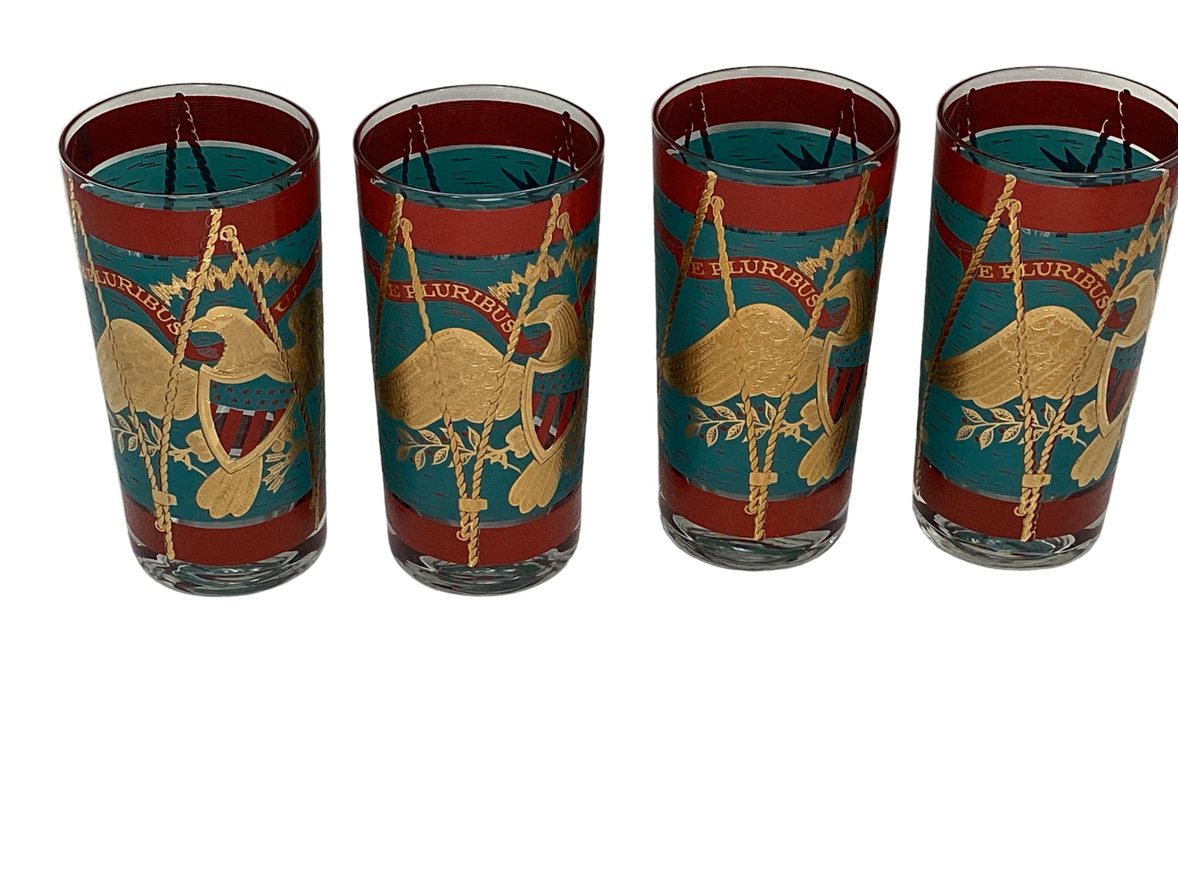Set of 8 Vintage Cera Glassware Highball Glasses in the Regimental Drum pattern. Mid-Century Modern highball glasses decorated as parade drums in teal and red enamel with 22 karat gold. The front with a large patriotic eagle below a banner with the