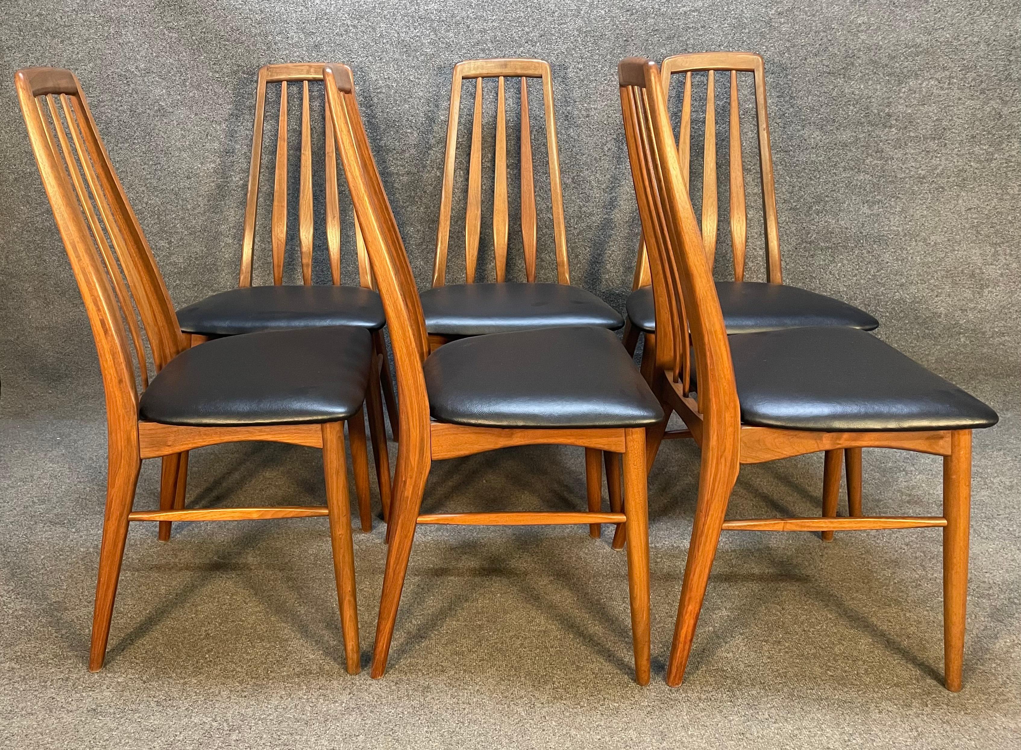 Here is a beautiful set of 8 vintage Scandinavian modern dining chairs in solid walnut designed by Niles Koefoed and manufactured by Koefeds Hornslet in Denmark in the 1960's.
This rare set, 6 side chairs and two captain chairs feature a sculptural