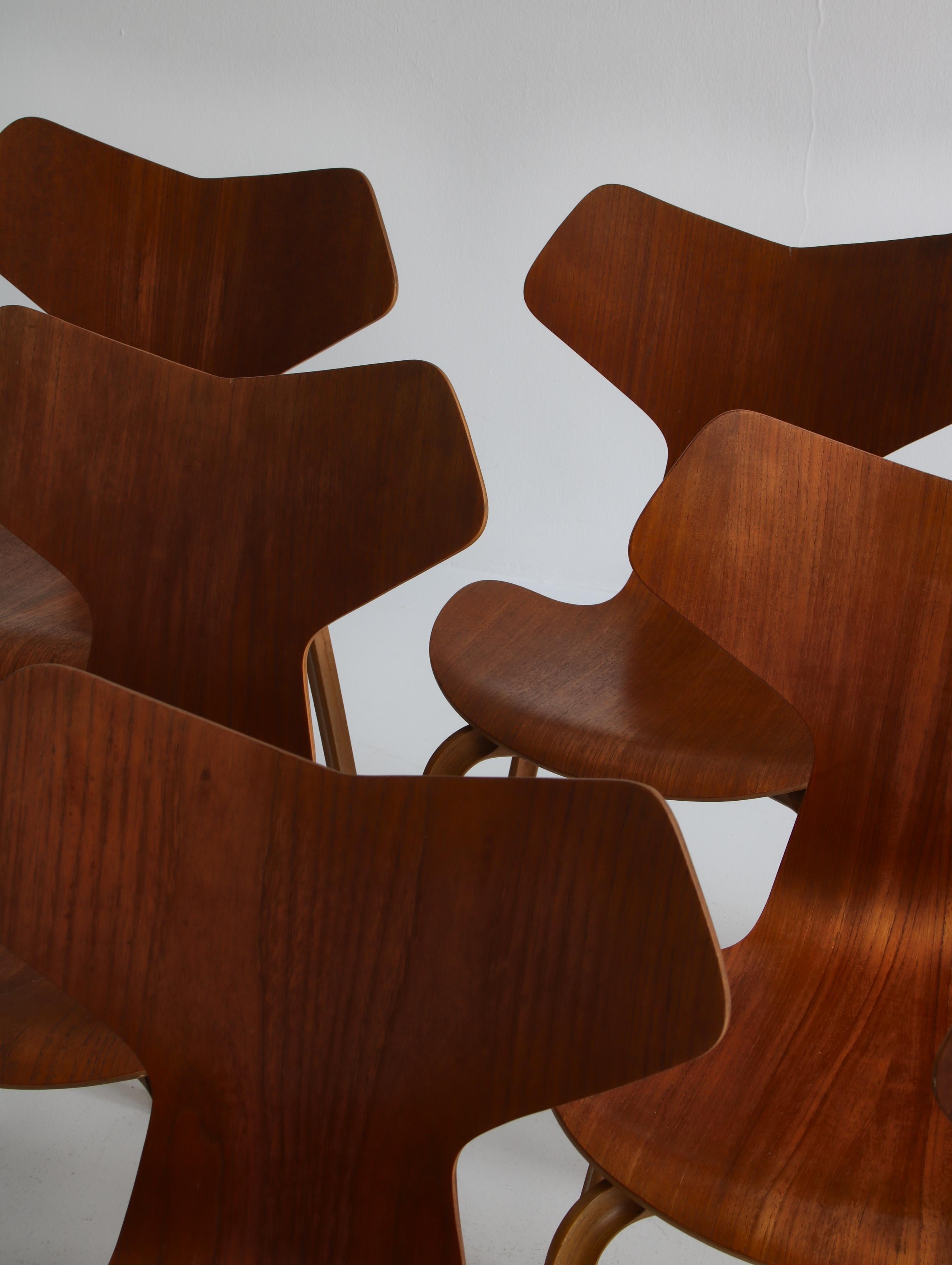 8 Vintage teak wood Dining Chairs 