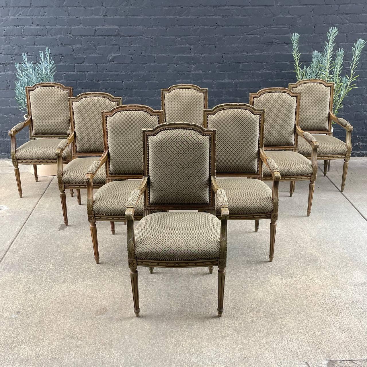 Set of 8 Vintage French Louis XV Sculpted Arm Chairs

Original Vintage Condition
Materials: Painted Wood, Spring Cushions
Dimensions: 
42”H x 23”W x 22”D
Seat Height 19”