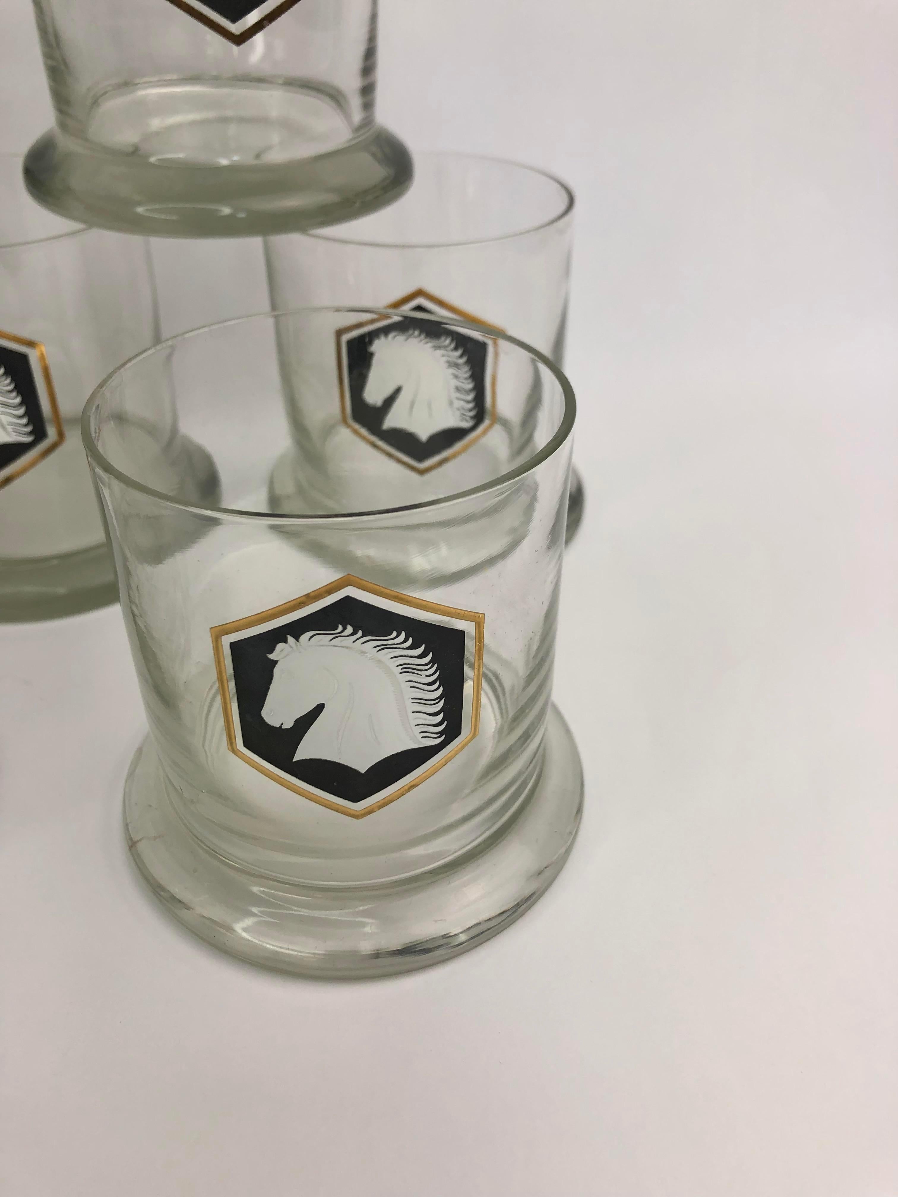 Set of 8 Vintage Horses Rocks Glasses. Unusual form with an extra thick base. Each glass with a white horse head on a black background trimmed in 22 carat gold. All are in excellent vintage condition