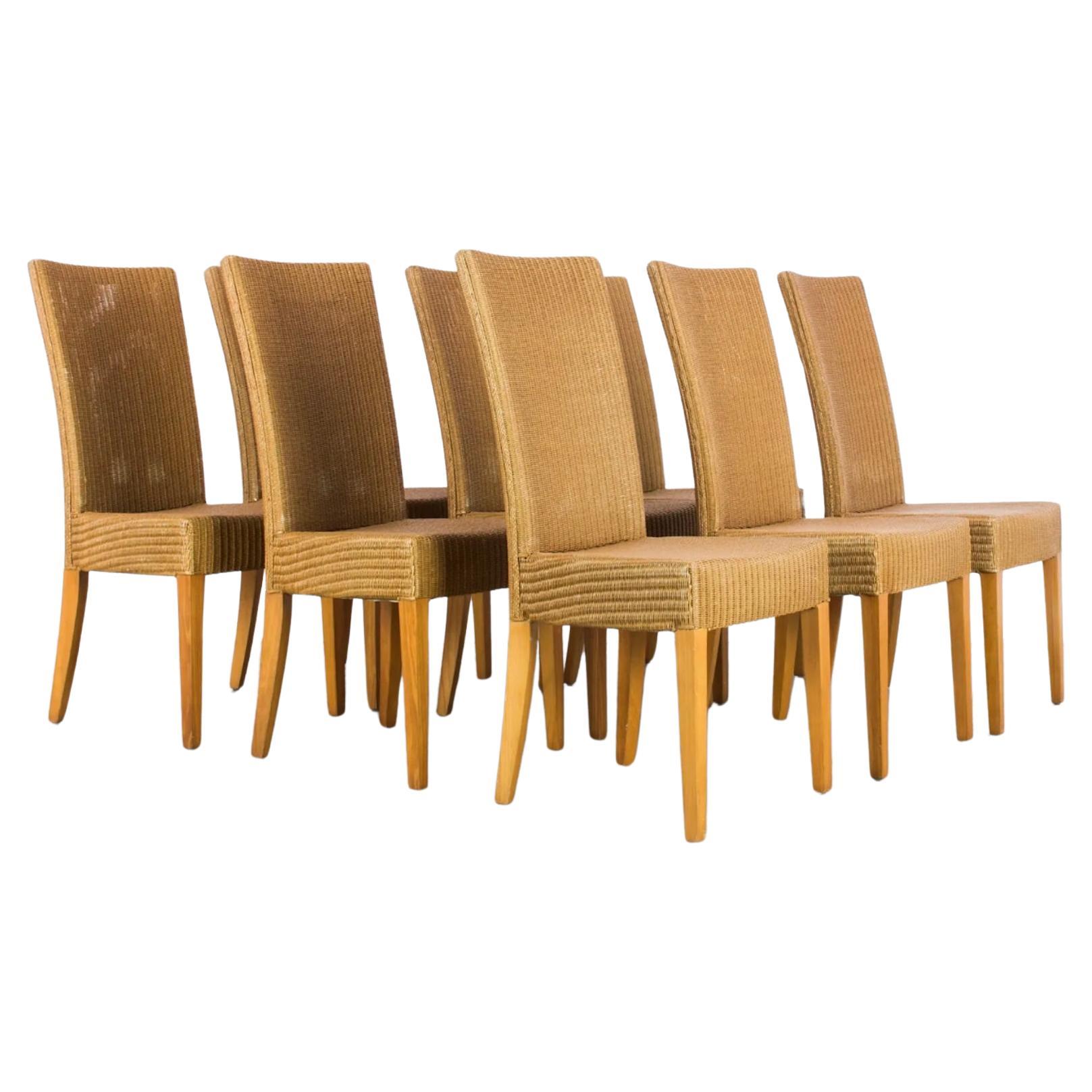 Woven Set of 8 Vintage Mid Century All Wicker Dining room chairs by Lloyd Loom