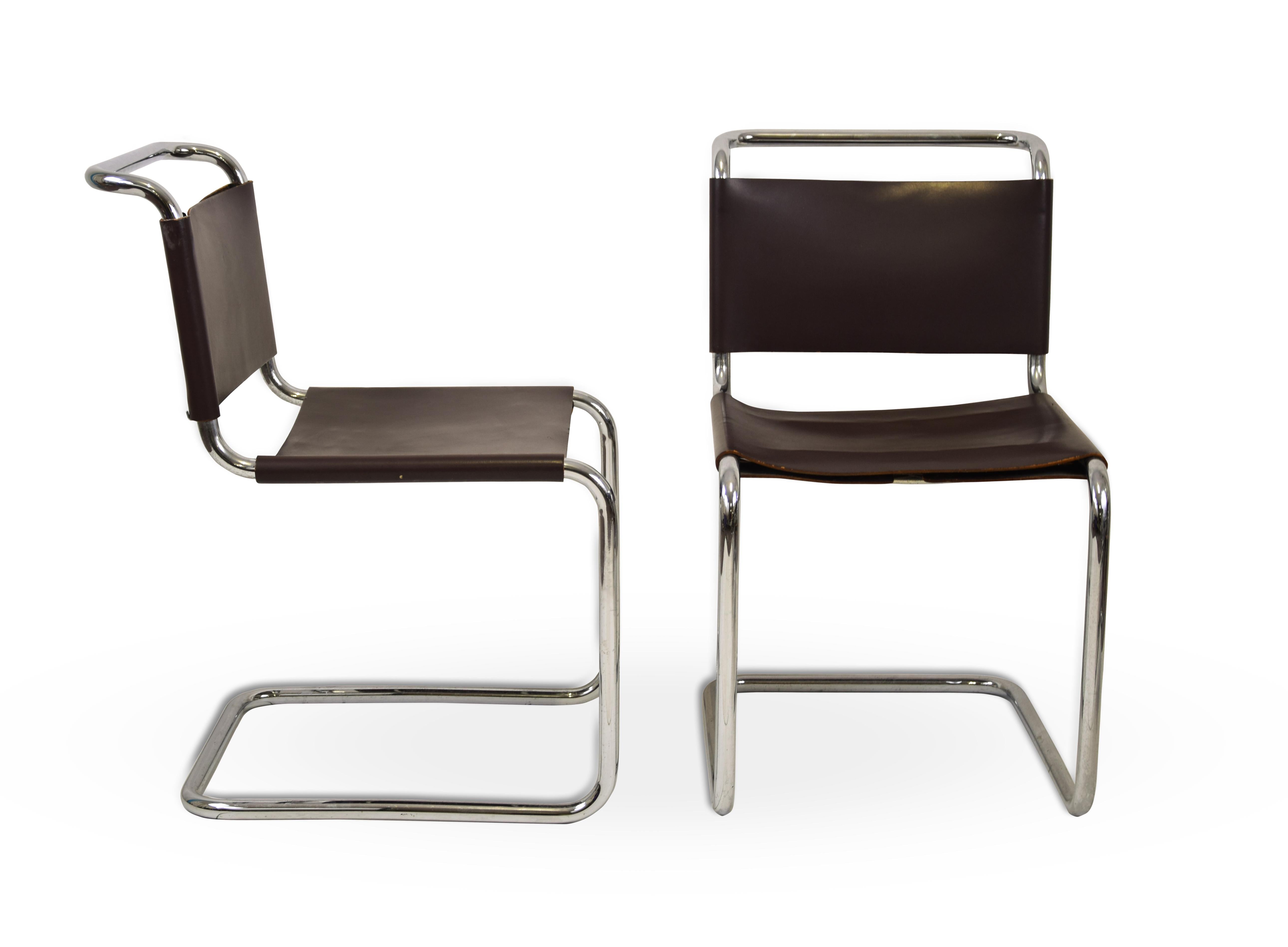 This is a beautiful Set of 8 Spoleto chairs, designed by Knoll Studio Company in the 1970s.

Each chair has a tubular frame in chromed steel, the seat and back in thick leather, stretched with nylon laces. 

Cover in dark brown leather.

The