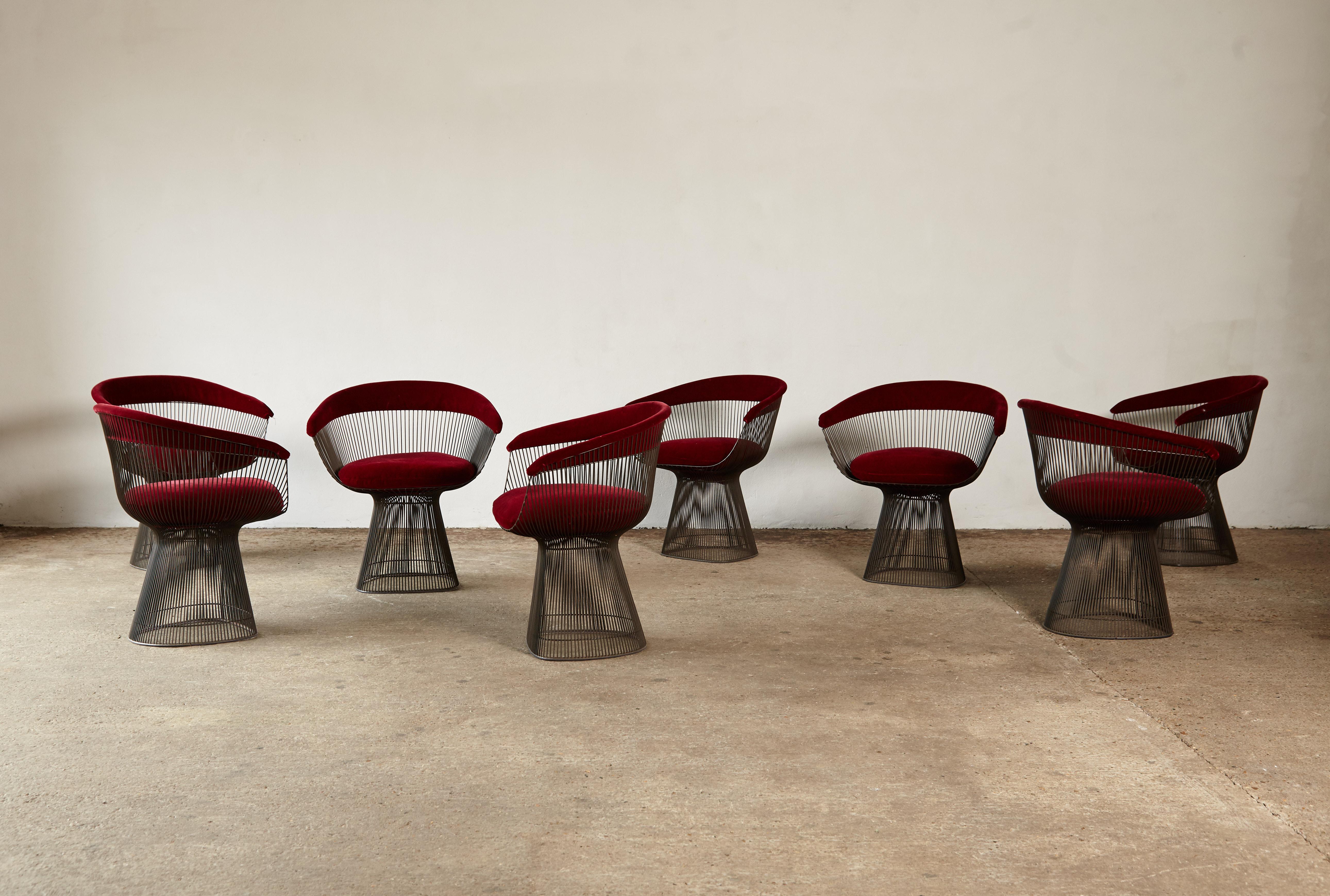 Set of 8 Warren Platner for Knoll wire dining chairs, bronze coated enameled steel with red velvet seats, USA. In good original vintage condition - some minor separations of the upholstery from the chair frames. We can repair these if the chairs