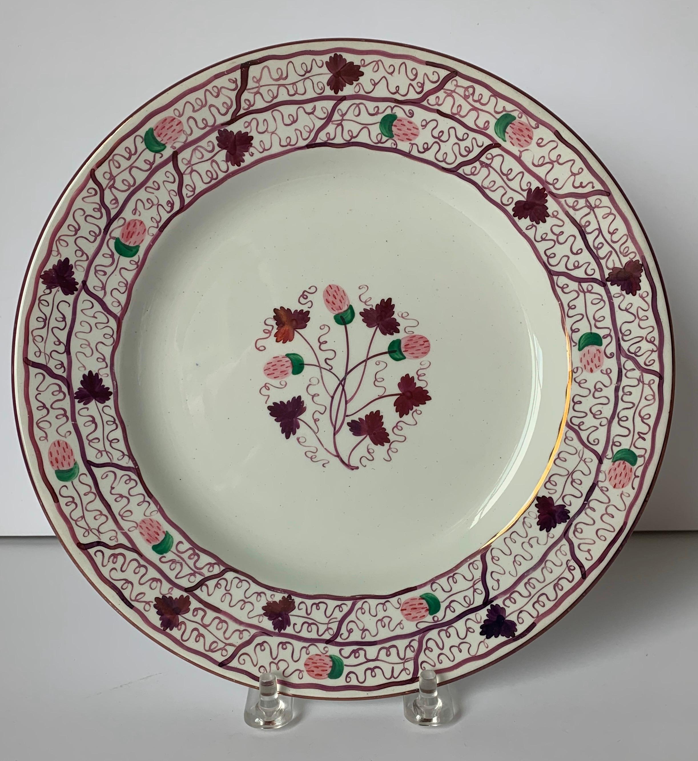 Set of 8 Wedgwood strawberry lustre dessert plates. Stamped Wedgwood on the underside.