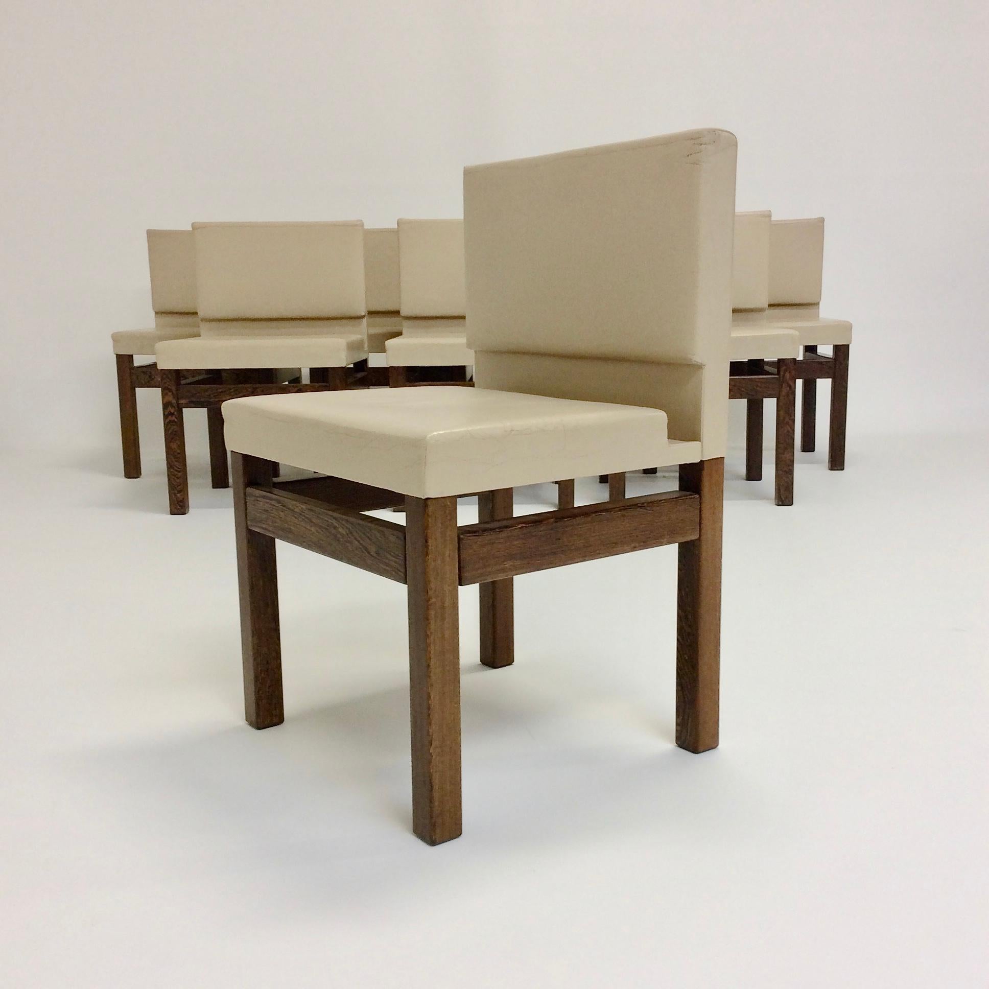 Set of 8 dining chairs design attributed to Veranneman, circa 1960, Belgium.
Wengé and mastic leather.
Dimensions: 78 cm H, 49 cm W, 46 cm D, seat height: 46 cm.
Original condition.