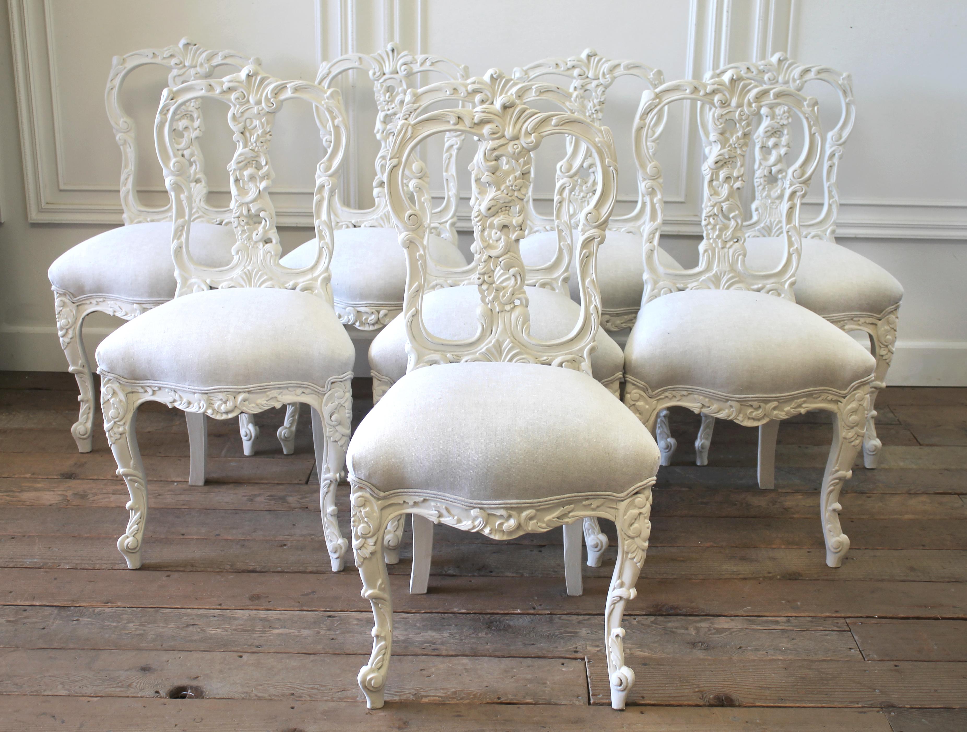 Set of 8 white carved and painted dining chairs
Lots of beautiful detailed carving along the inside back and legs. We reupholstered these in a light natural linen, finished with a double welt trim. Each chair is solid and sturdy ready for everyday
