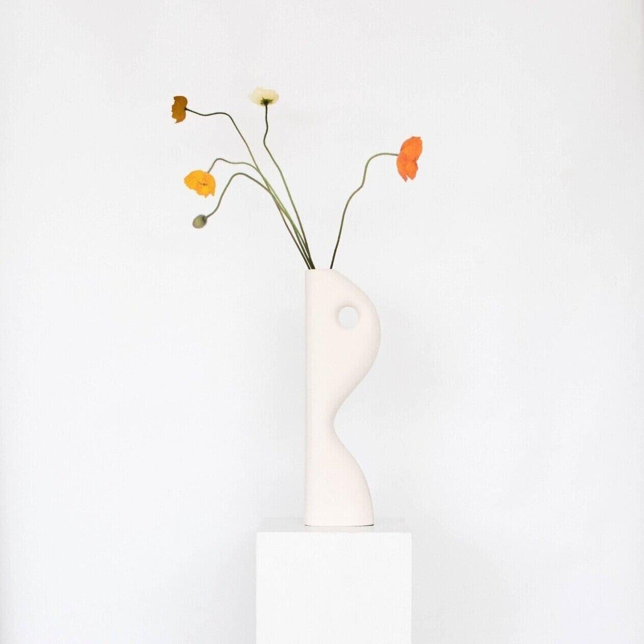 A Set of 8 White Lea Matt Vases by Valeria Vasi
Handmade in Barcelona, 2021
Materials: stoneware, clay
Dimensions: 33,5 x 10 x 4cm
Also available in: Baby blue, terracotta. 

A sculptural stoneware vase entirely crafted in Barcelona by skilful