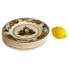 Set of 8 wonderful hand colored earthenware plates ca. 1830-40