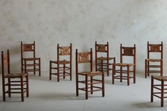 Set of 8 Wood + Rush Dining Chairs in the Style of Charles Dudouyt, France 1940s