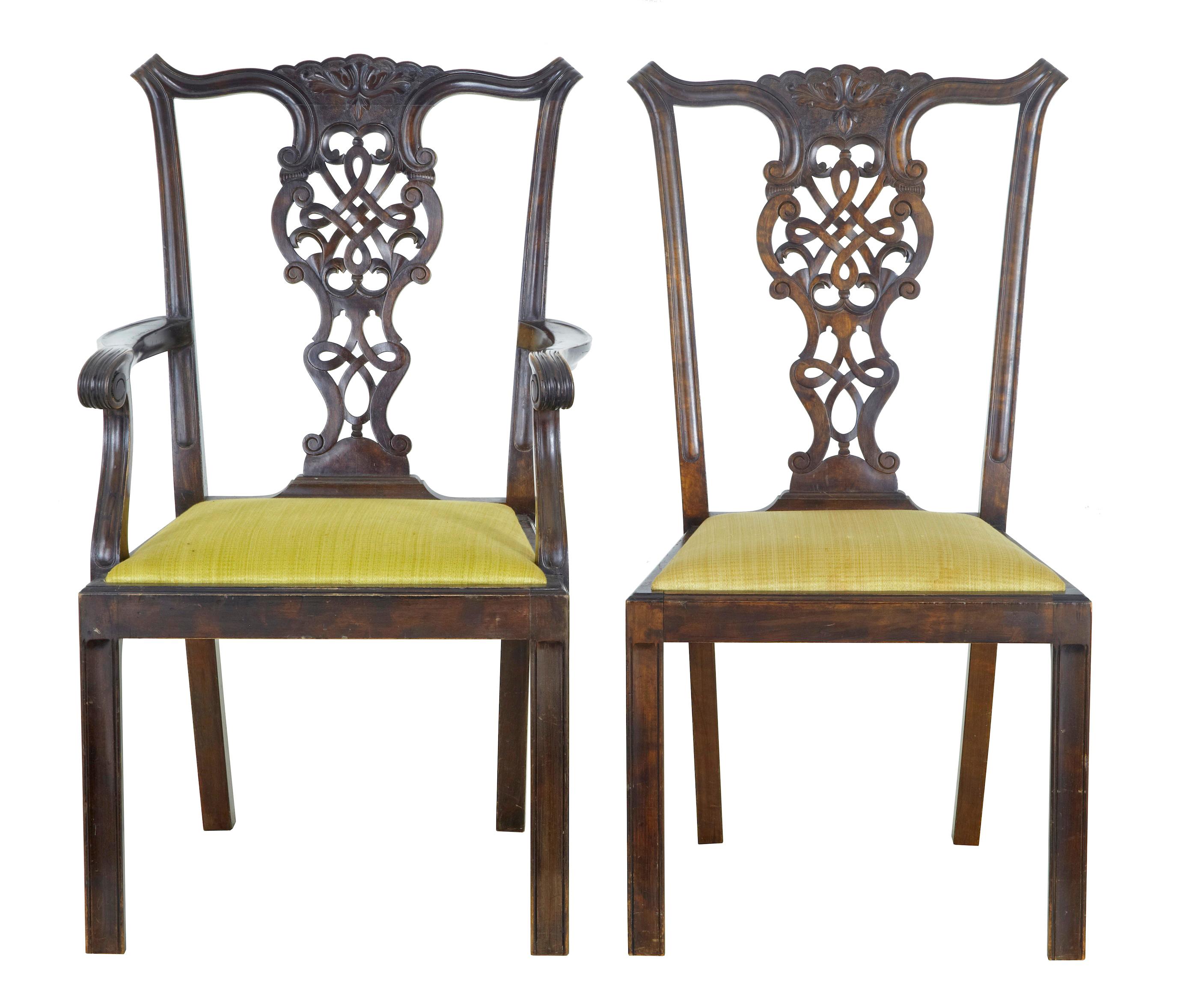 Set of 8+2 19th century carved birch chippendale design dining chairs circa 1890.

Comprising of 6 single and 2 armchairs. Pierced and carved back rests, carved and shaped scrolling arms. Stained dark birch in color. Structurally sound. Drop in