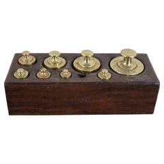 Set of 9 Used Brass Scale Weights in Wood Block Apothecary 1920s