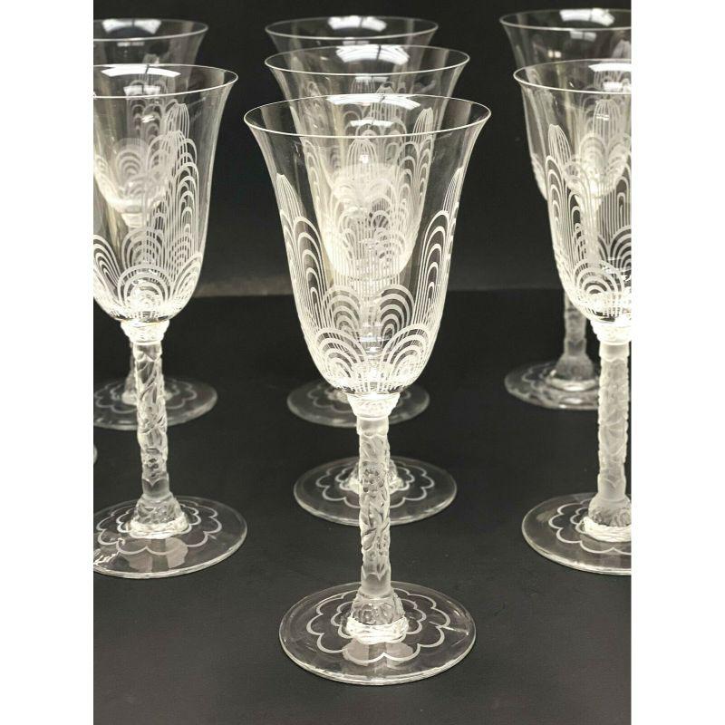 Set of 9 Baccarat France crystal glass etched water goblets in Jets D'Eau

9 Baccarat France crystal glass etched water goblets in Jets D'Eau, Signed, Frosted floral stem with acid etched arches. Marked Baccarat to the underside base.