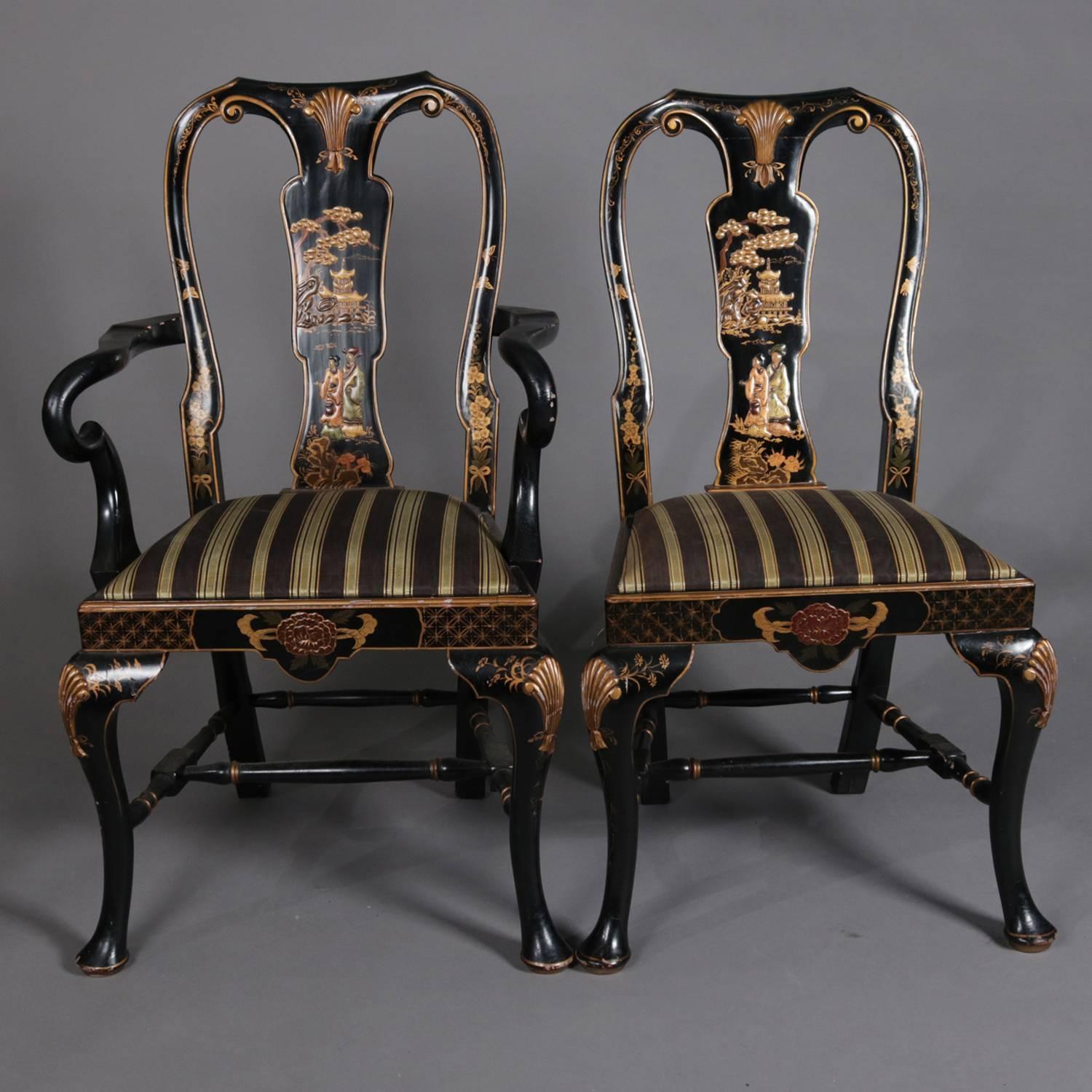 Set of nine Chinoiserie carved and upholstered dining chairs feature ebonized finish, hand-painted sculpted scene with villagers and pagoda, gilt banding and highlights throughout, seated on sculpted and gilt decorated cabriole legs; set with one