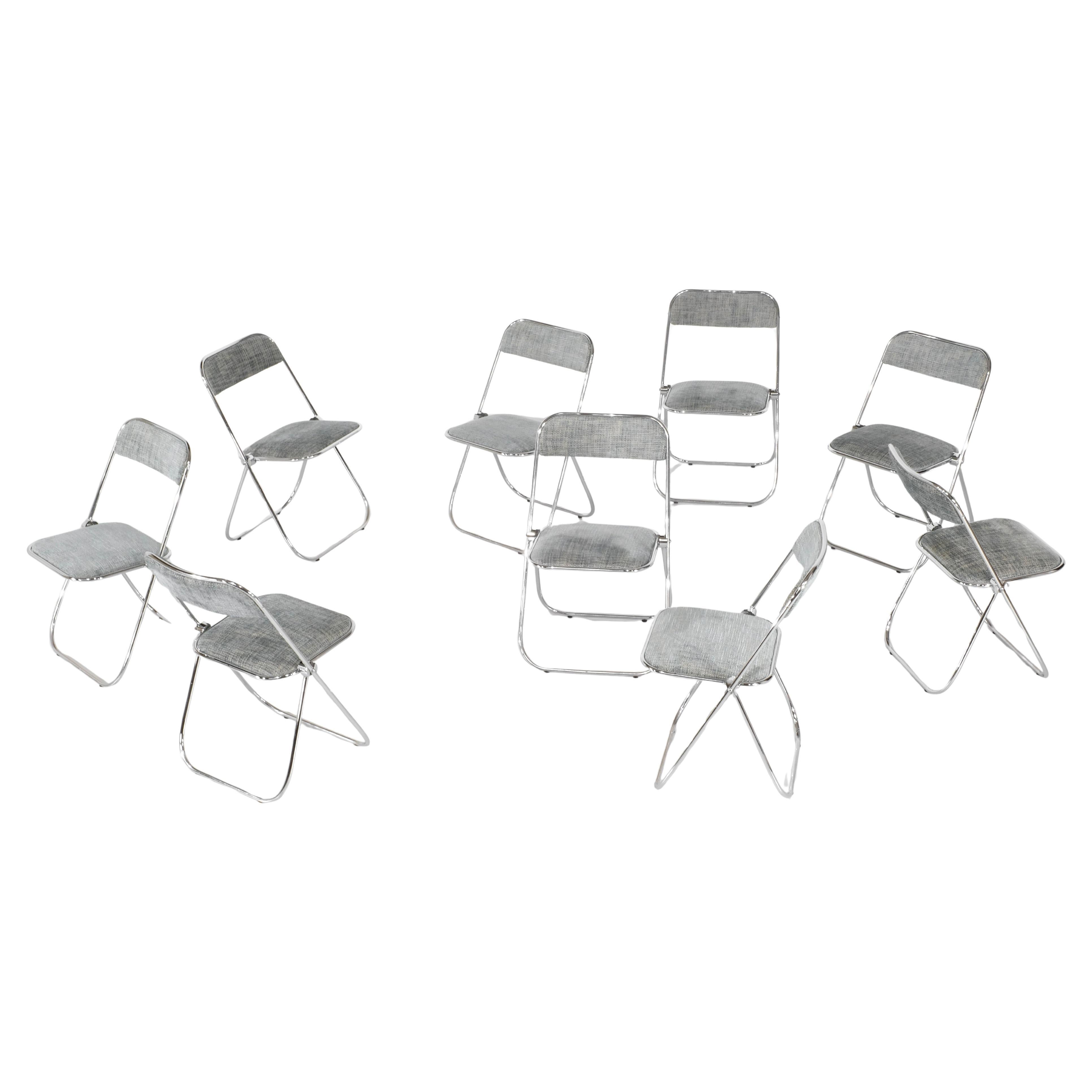 Set of 9 chrome folding chairs with fabric from the 1970s.