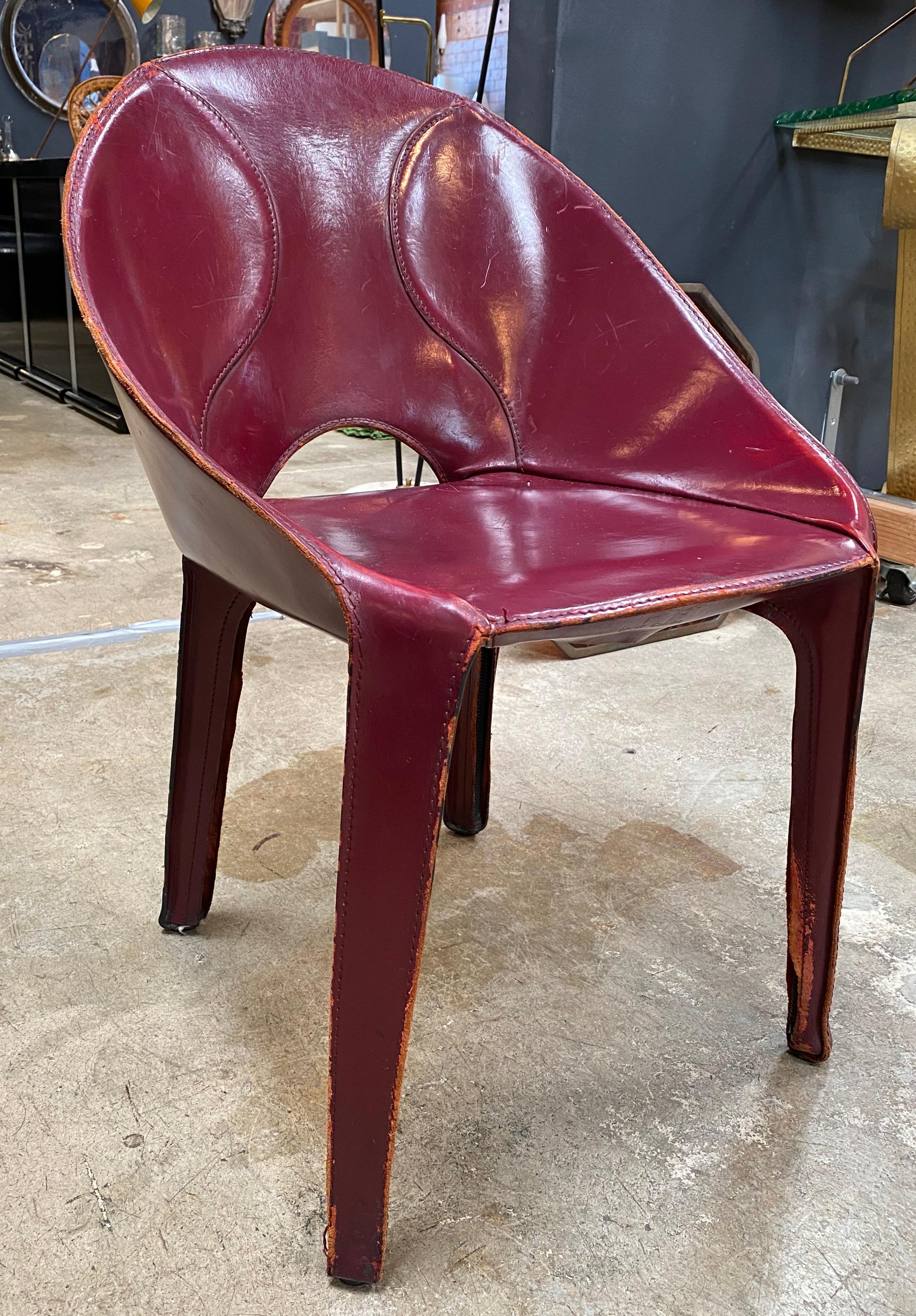 Beautiful set of 9 burgundy patina leather chairs for Cassina studio, 1970s, Italy.
The chair is very comfortable and unique.

We are also available to sell the chairs individually.
Other group of identical chairs are available.