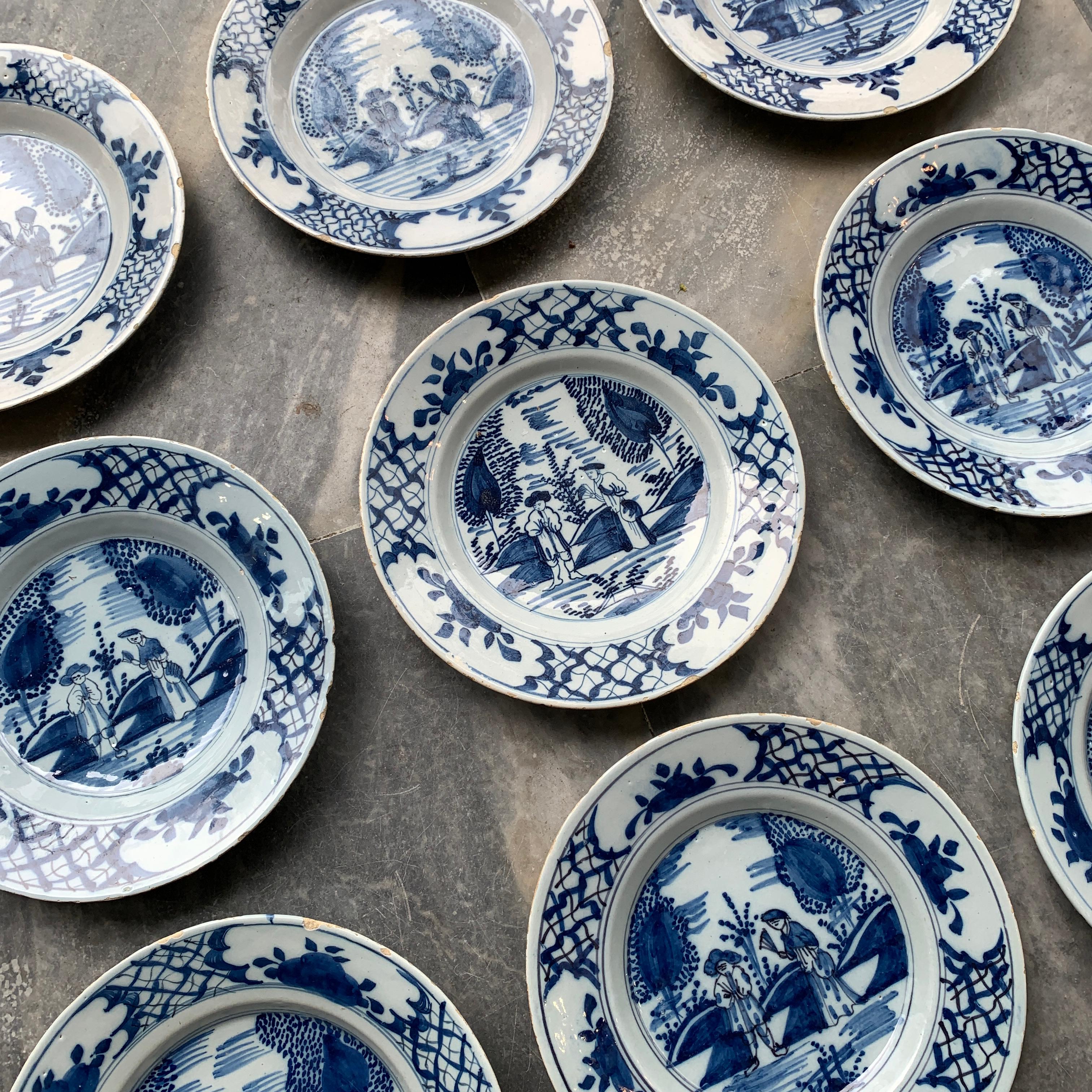 City: Delft
Workshop: Unknown
Date: circa 1760 - 1780

A wonderful set of no less than nine Dutch Delft plates with a lovely decoration of a couple in a garden. Probably based on the Chinese porcelain plate with the Governor Duff