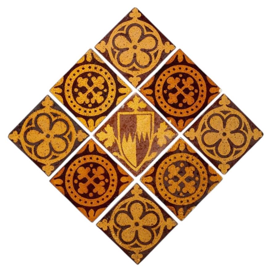 Ensemble de 9 carreaux encaustiques de style Tudor Revival par Craven Dunhill & W.Godwin