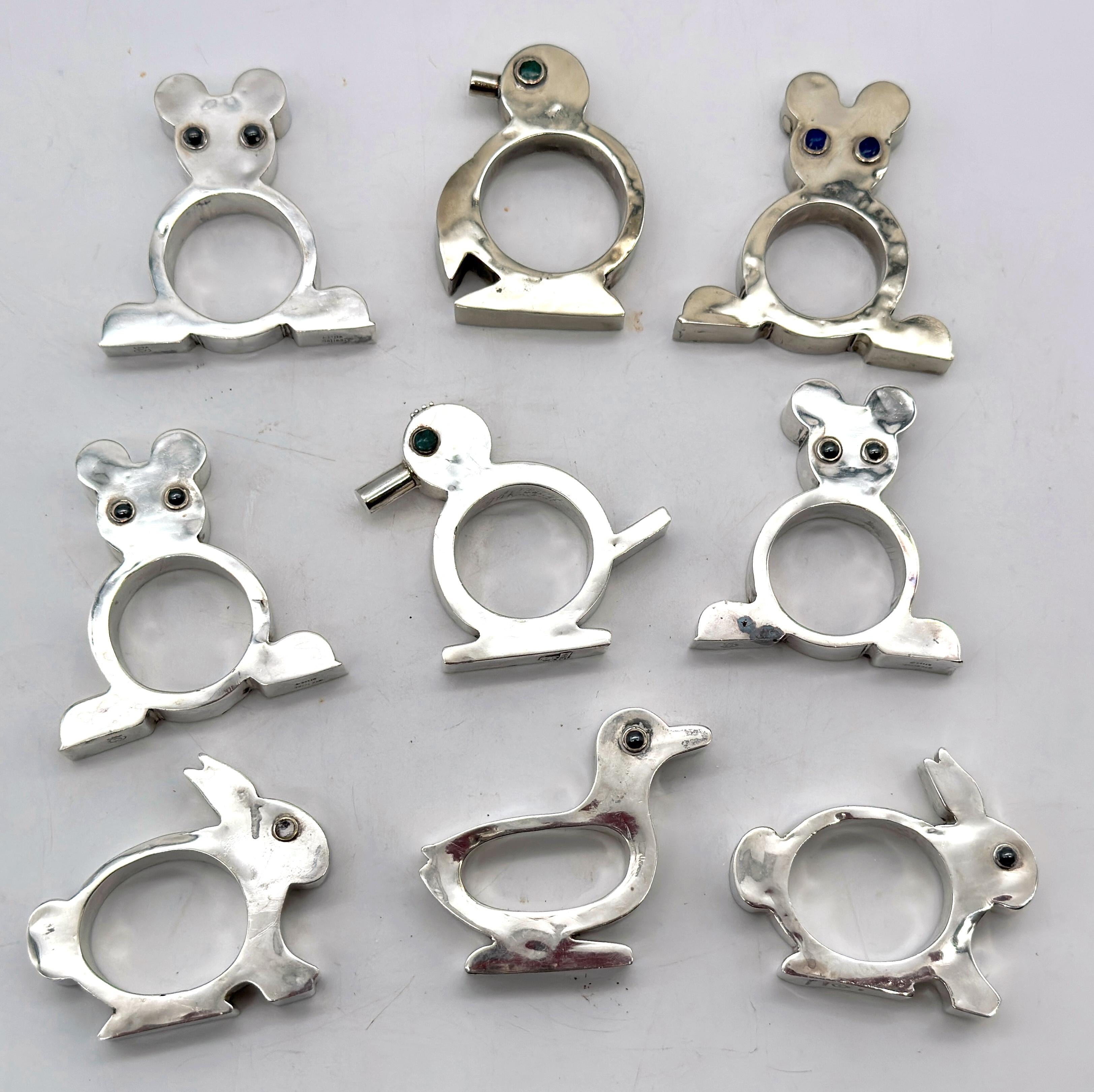 Satz von 9 figuralen Serviettenringen aus Sterlingsilber, Taxco-Schule, Mexiko, Mitte des 20.

Ein skurriler und skulpturaler Satz von neun figuralen Serviettenringen aus handgearbeitetem Sterlingsilber, die der Taxco-Schule der Silberschmiedekunst