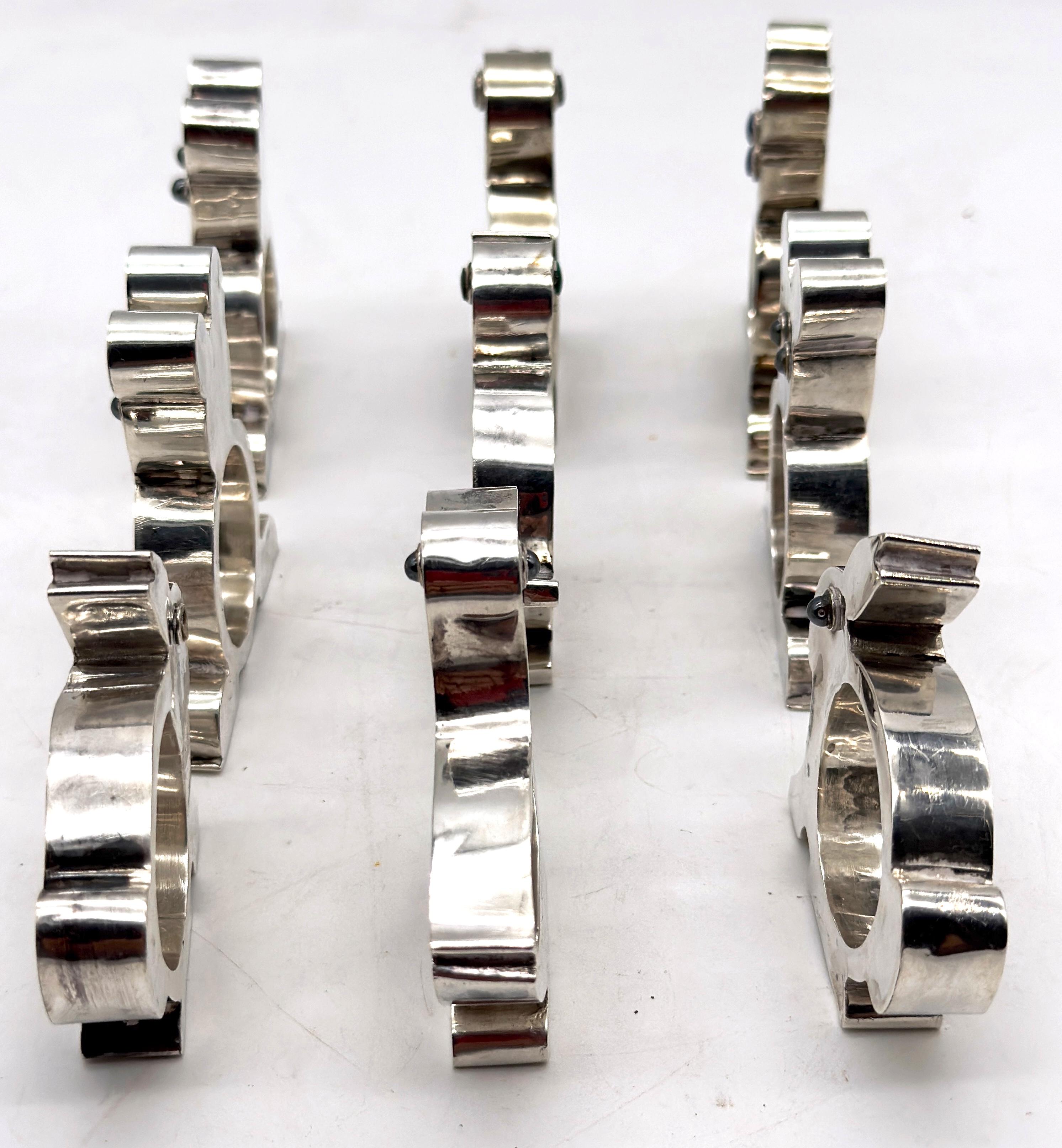 Satz von 9 Serviettenringen aus Sterlingsilber, Taxco Mexico, Mitte des 20. (Gegossen) im Angebot