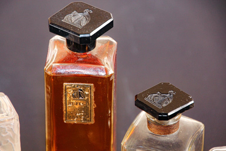 Set of 9 Lalique Creation Collectible Perfume Bottles In Good Condition For Sale In North Hollywood, CA