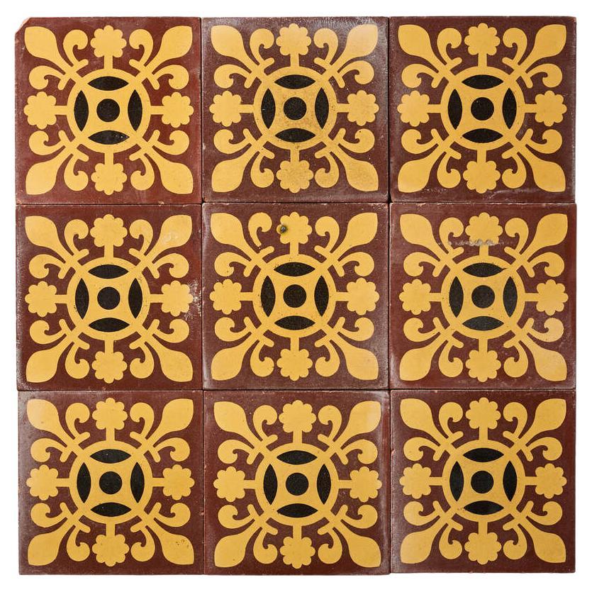 Set of 9 Reclaimed English Encaustic Patterned Tiles For Sale