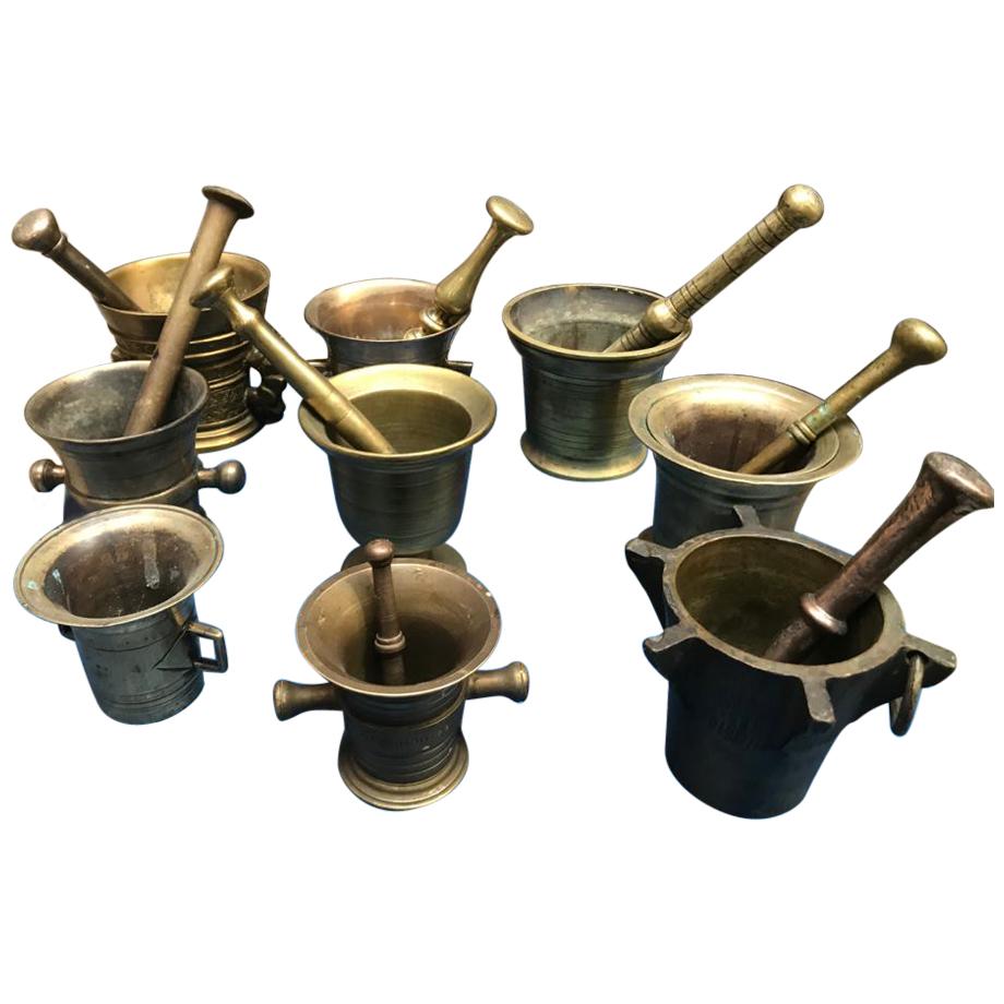 Graduated Set of Cast Iron Mortars and Pestles For Sale at 1stDibs