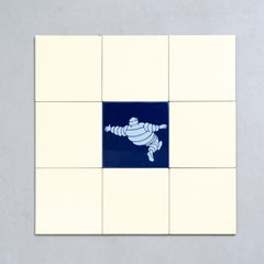 Set of 9 Vintage Beige - Yellow and Blue Michelin Man Tiles, circa 1960