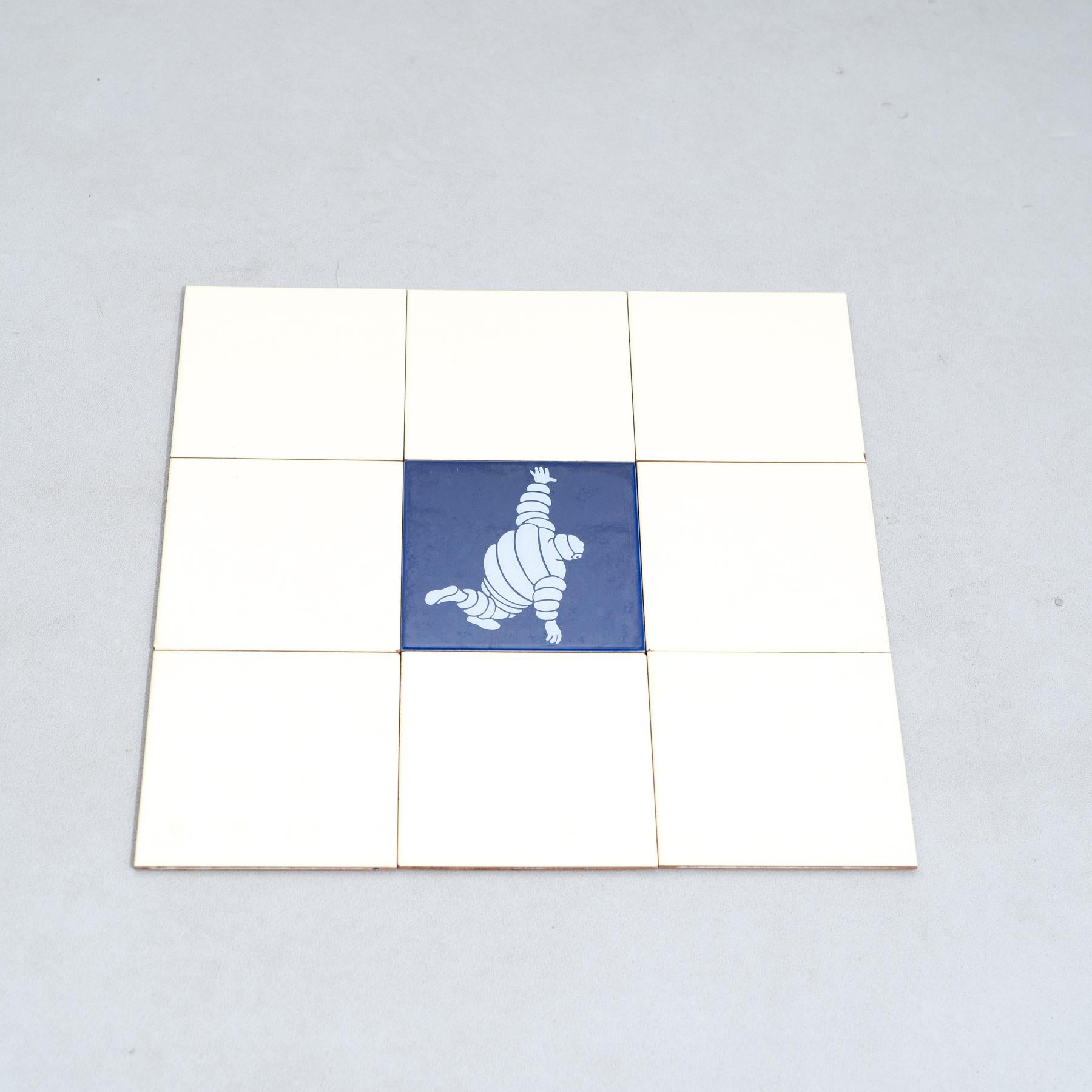 Mid-Century Modern Set of 9 Vintage Beige - Yellow and Blue Michelin Man Tiles, circa 1960