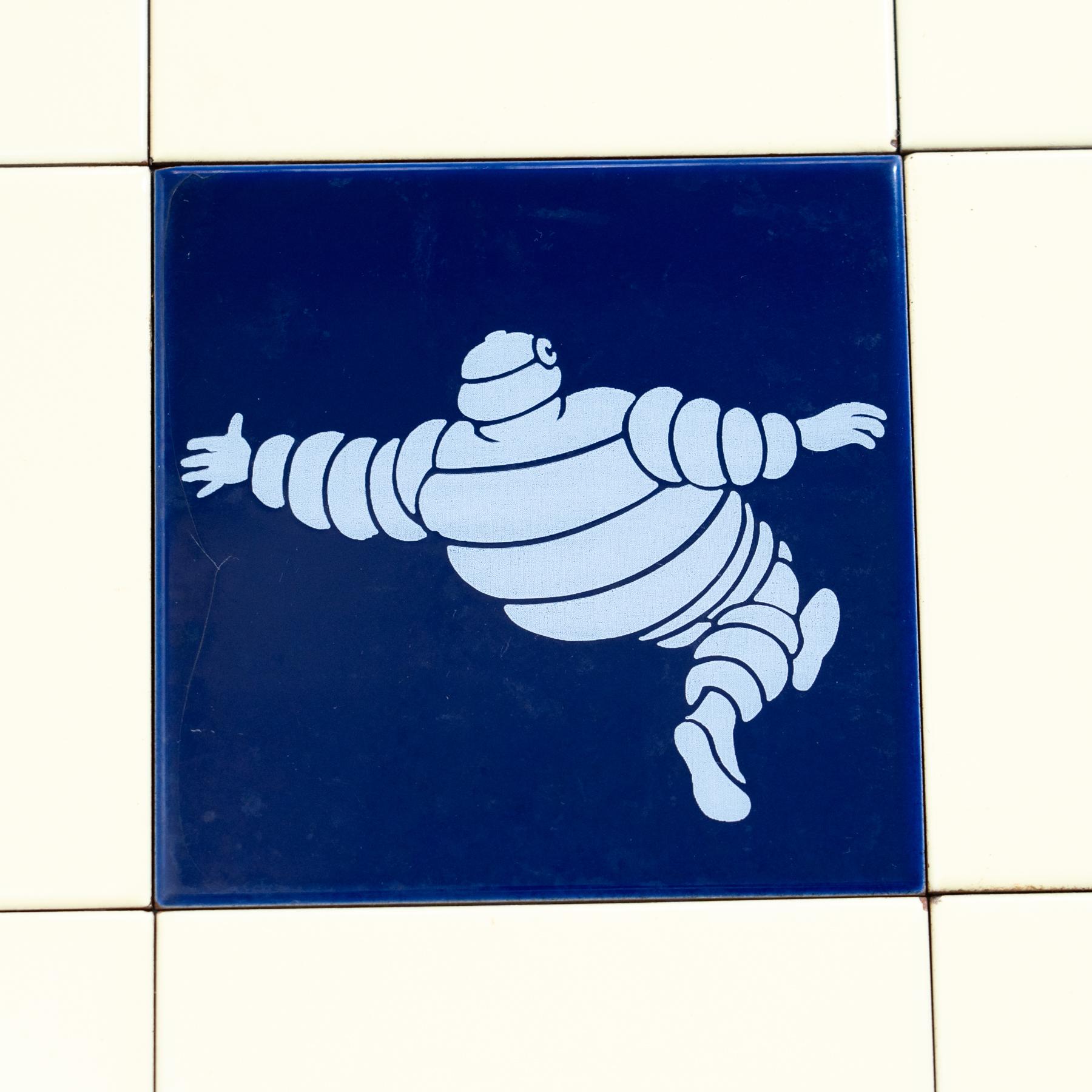 Mid-20th Century Set of 9 Vintage Beige - Yellow and Blue Michelin Man Tiles, circa 1960