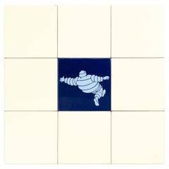 Set of 9 Vintage Beige - Yellow and Blue Michelin Man Tiles, circa 1960