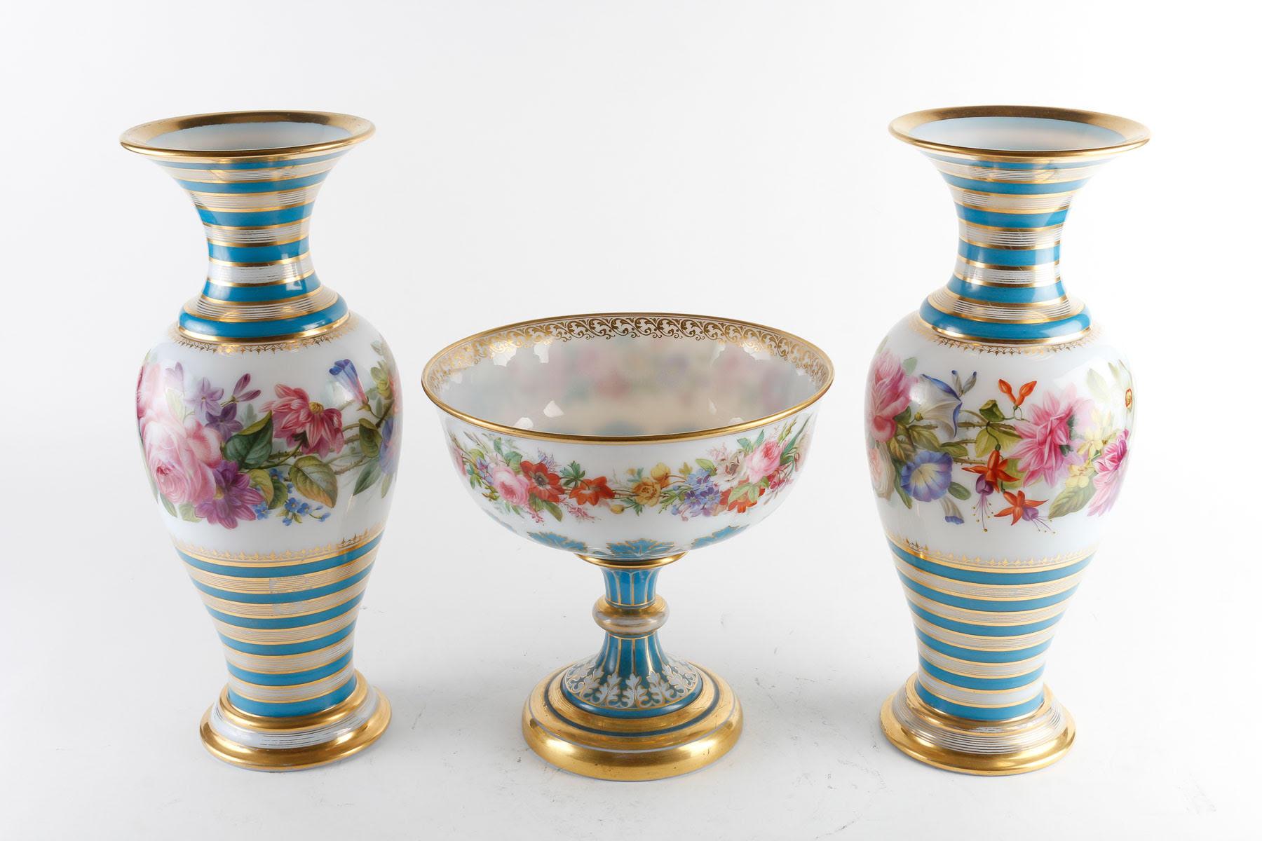 Important Set of a Pair of Vases and a Cup in Baccarat Opaline.

Set of a pair of Baccarat opaline vases and a Baccarat opaline cup, painted and enhanced with gold, 19th century, Napoleon III period.    

Cup: h: 25cm, d: 25cm
Vases: h: 40cm, d: 15cm